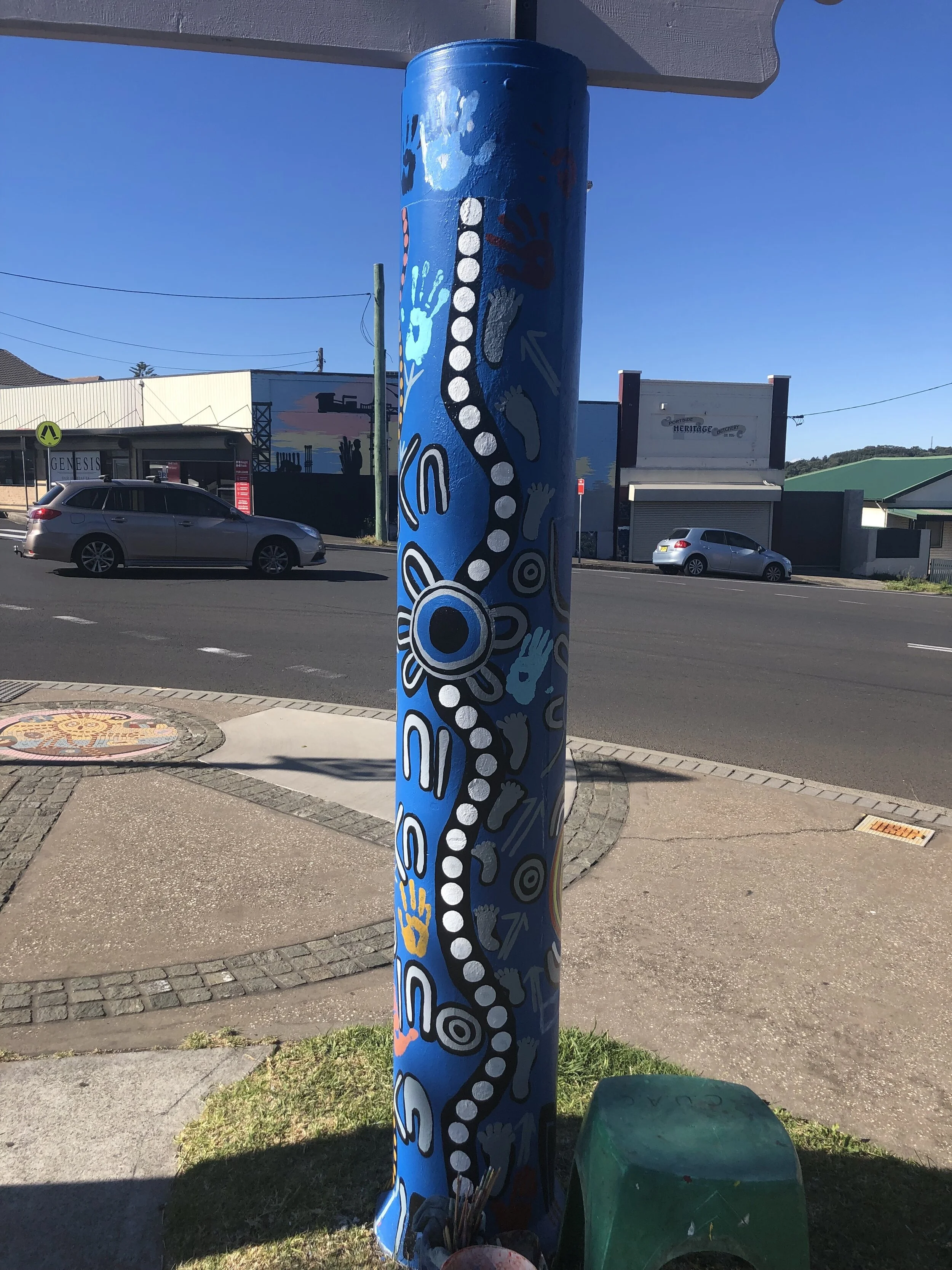 beautiful designs on totem poles in port kembla.jpeg