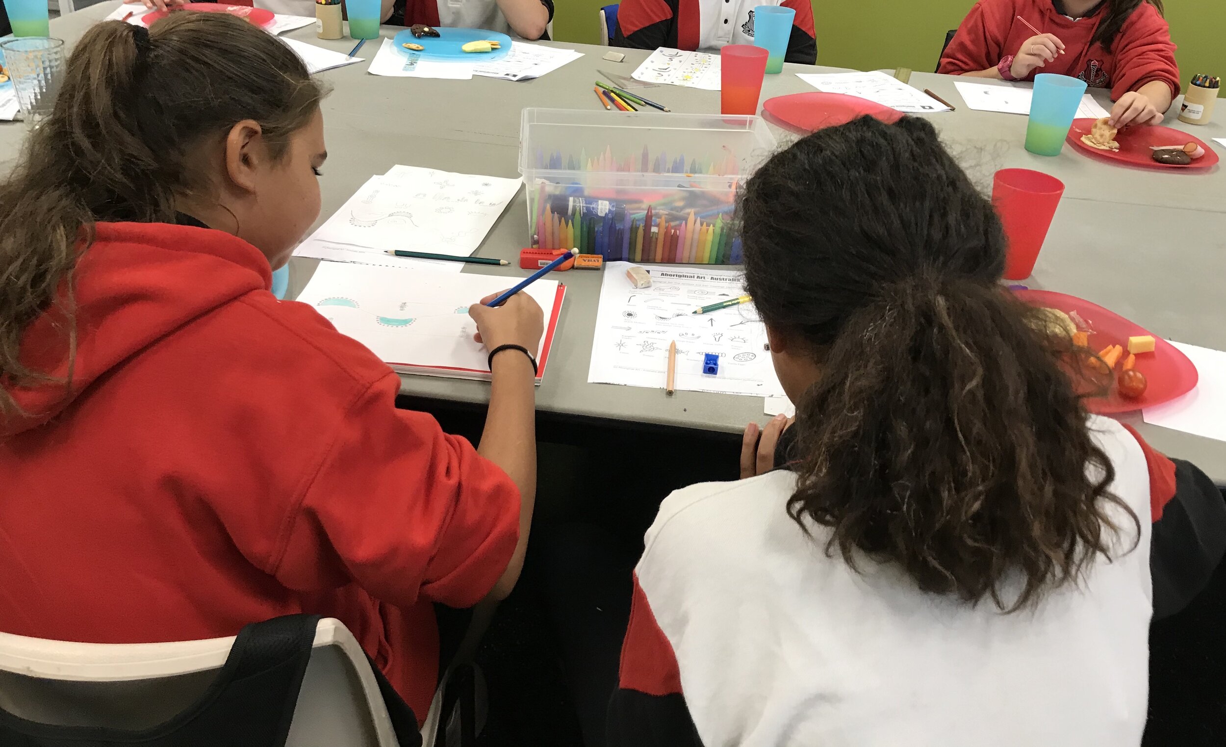 designing the totems for our community project.jpeg