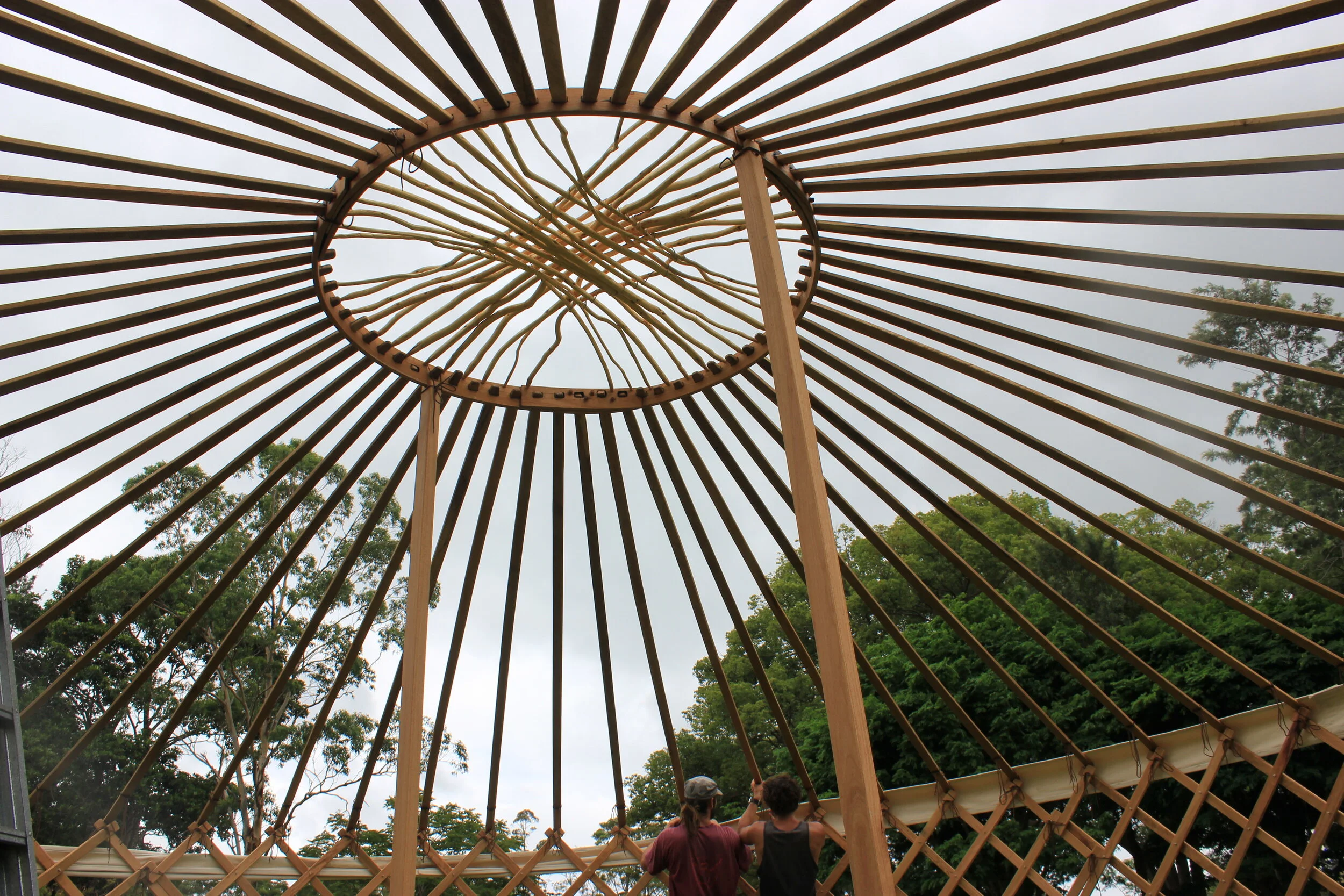 3 OCP Urban Grown building a Yurt frame.JPG