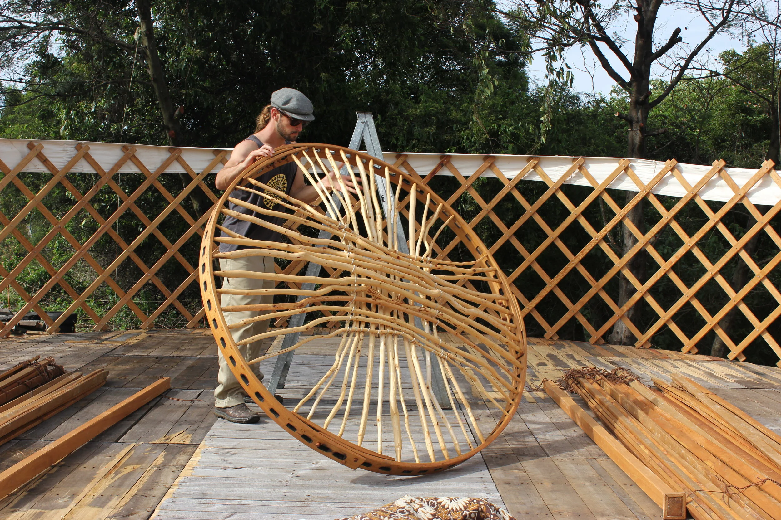 10 8 OCP Urban Grown building a Yurt frame.JPG