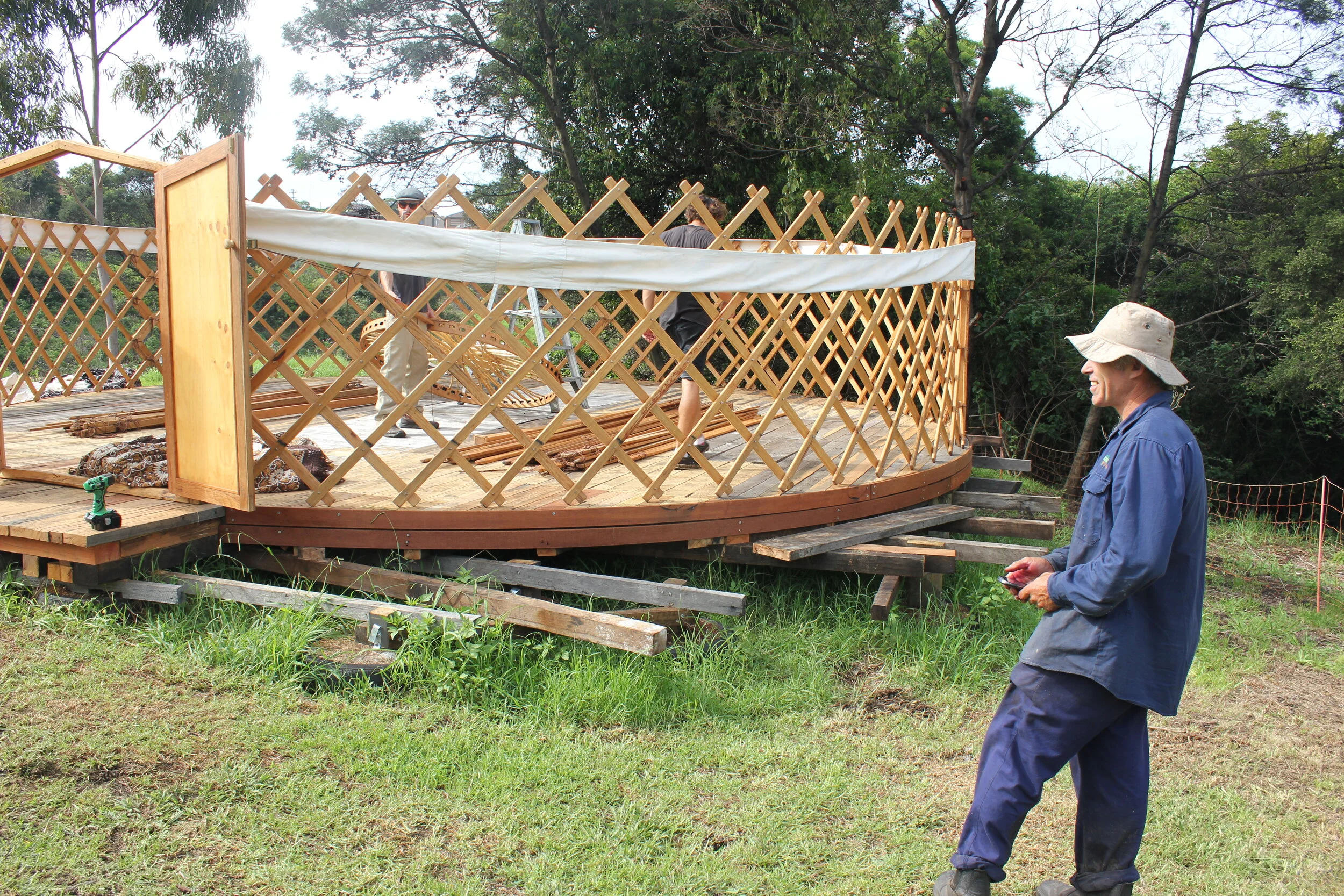 11 8 OCP Urban Grown building a Yurt frame.JPG