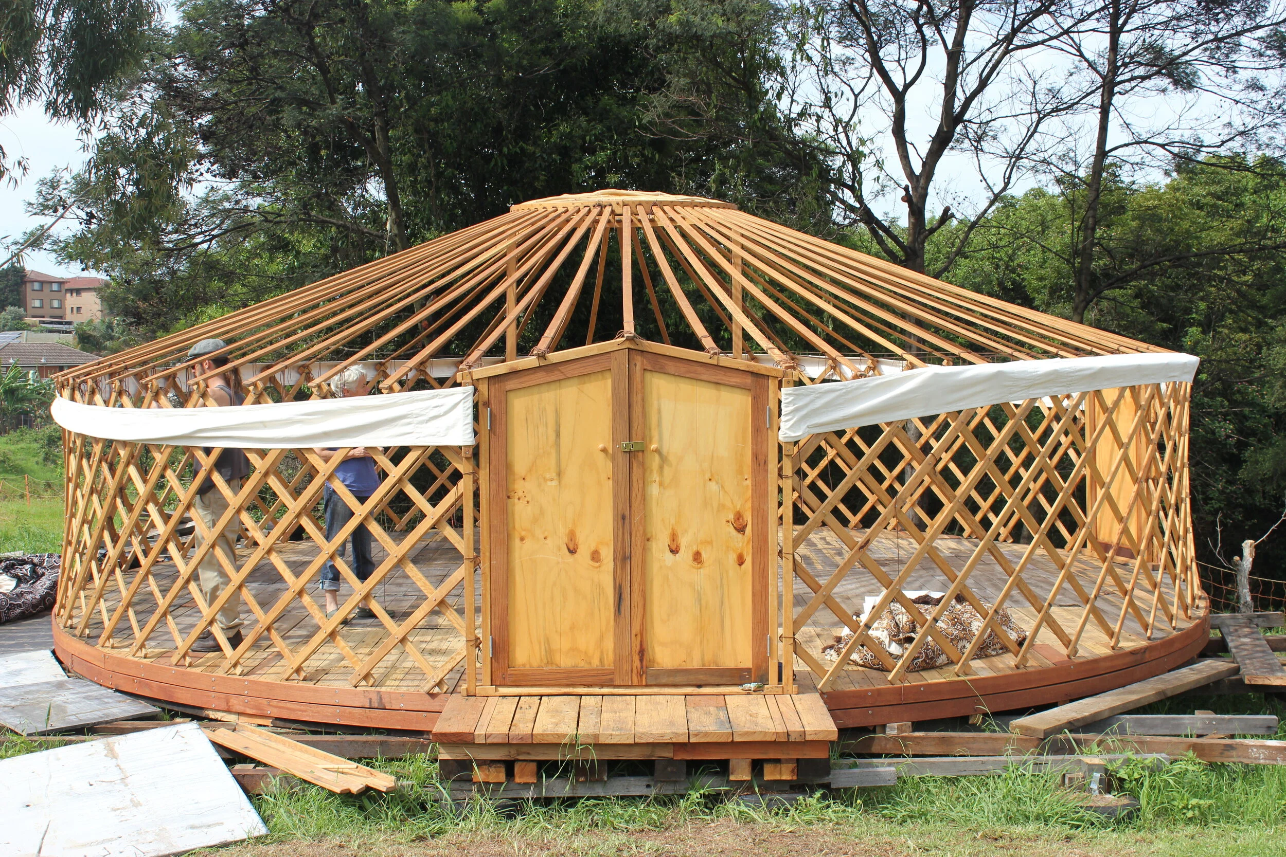 16  OCP Urban Grown building a Yurt frame.JPG