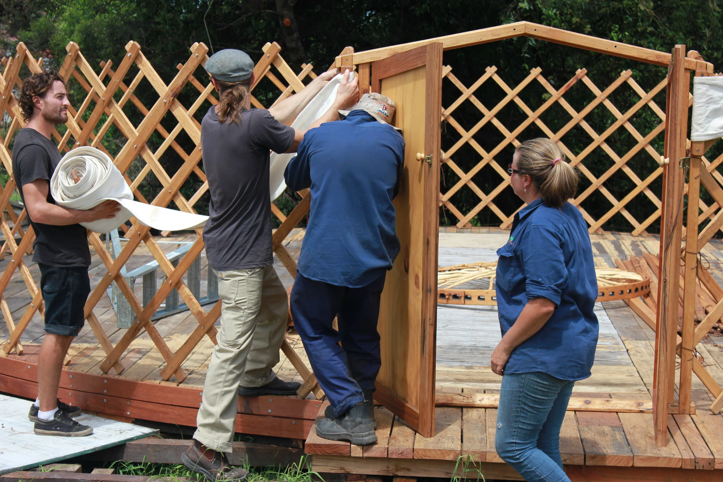 22  OCP Urban Grown building a Yurt frame.JPG