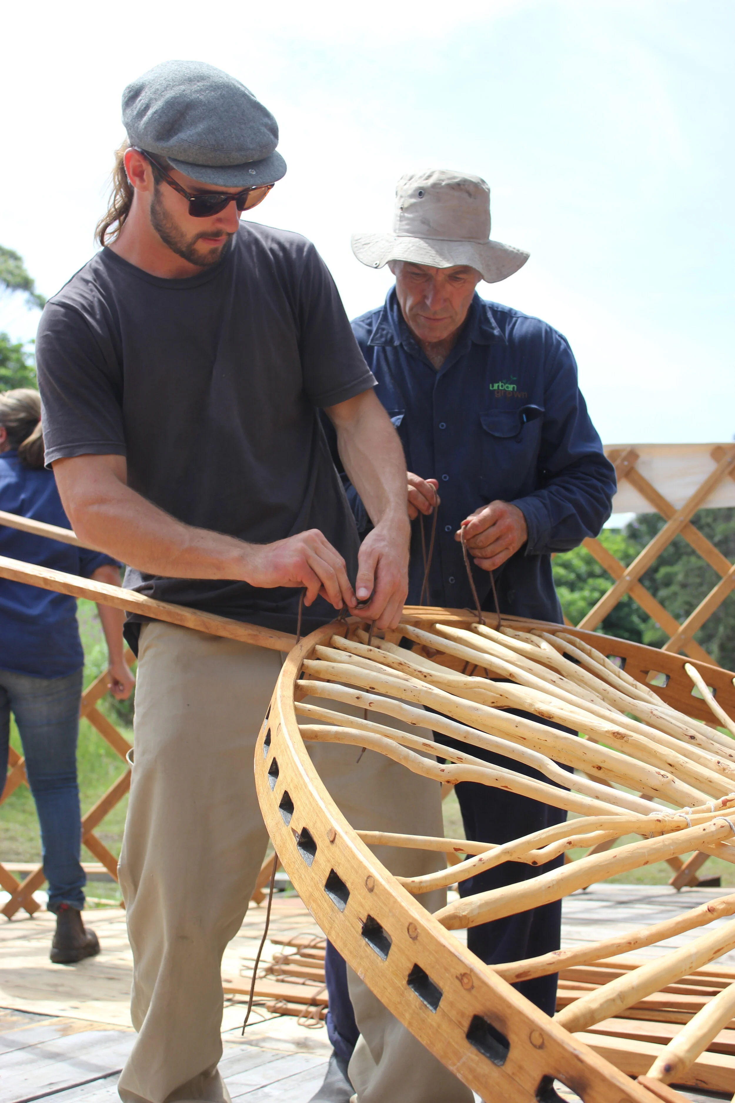 23 OCP Urban Grown building a Yurt frame.jpg