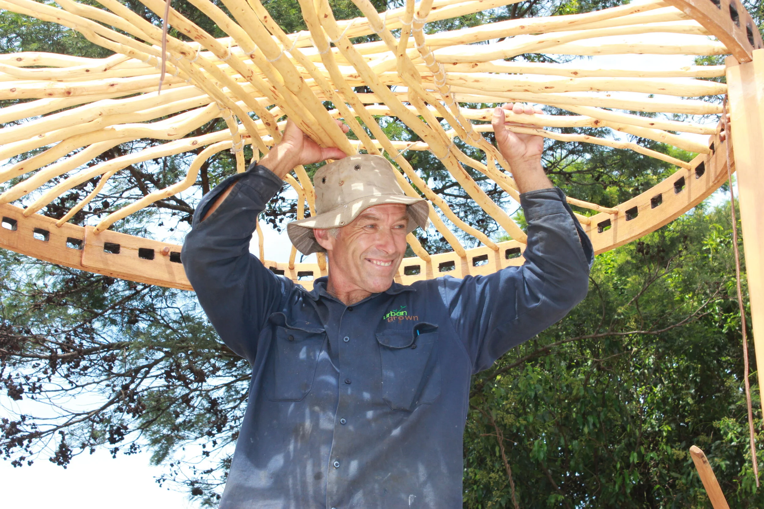 28 OCP Urban Grown building a Yurt frame.JPG
