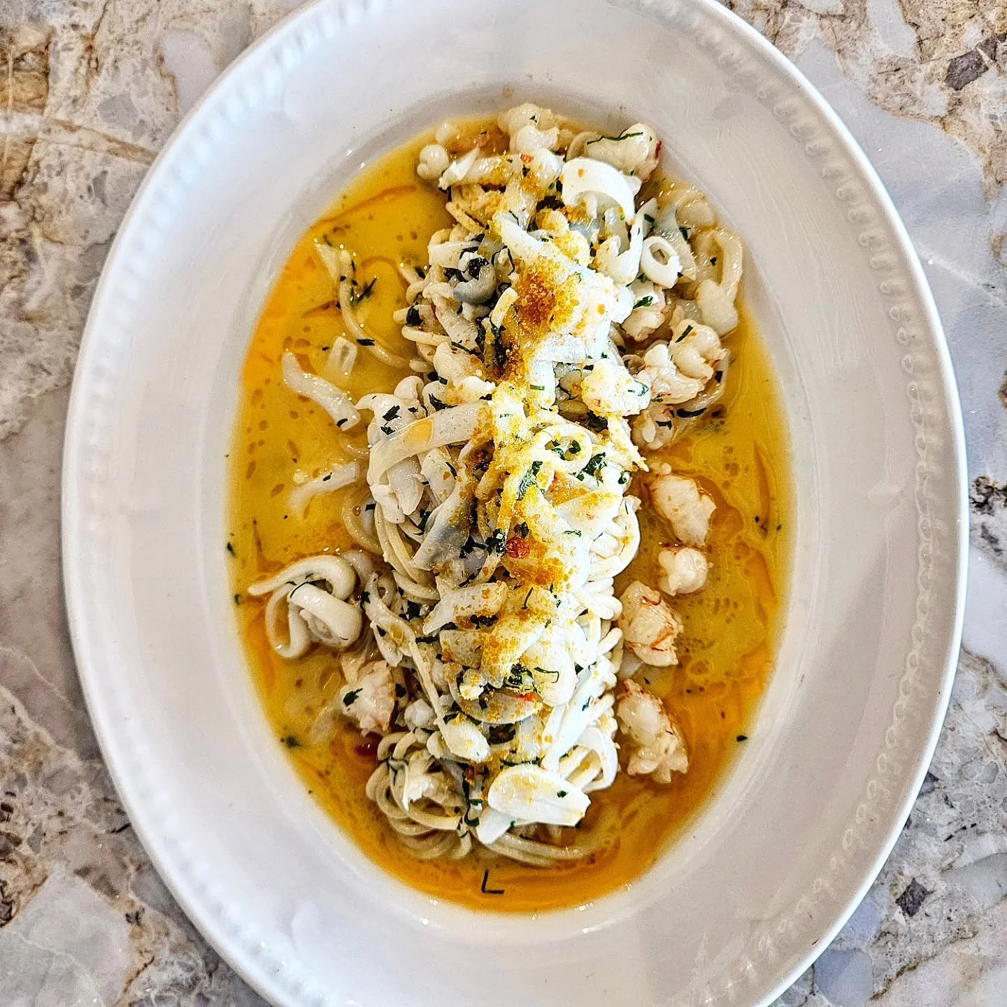 spaghetti, local cuttlefish, king prawn, shellfish oil, bottarga.