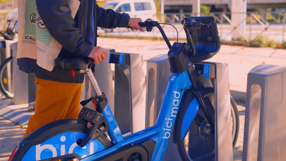 BiciMAD user on the move in Madrid (Spain)