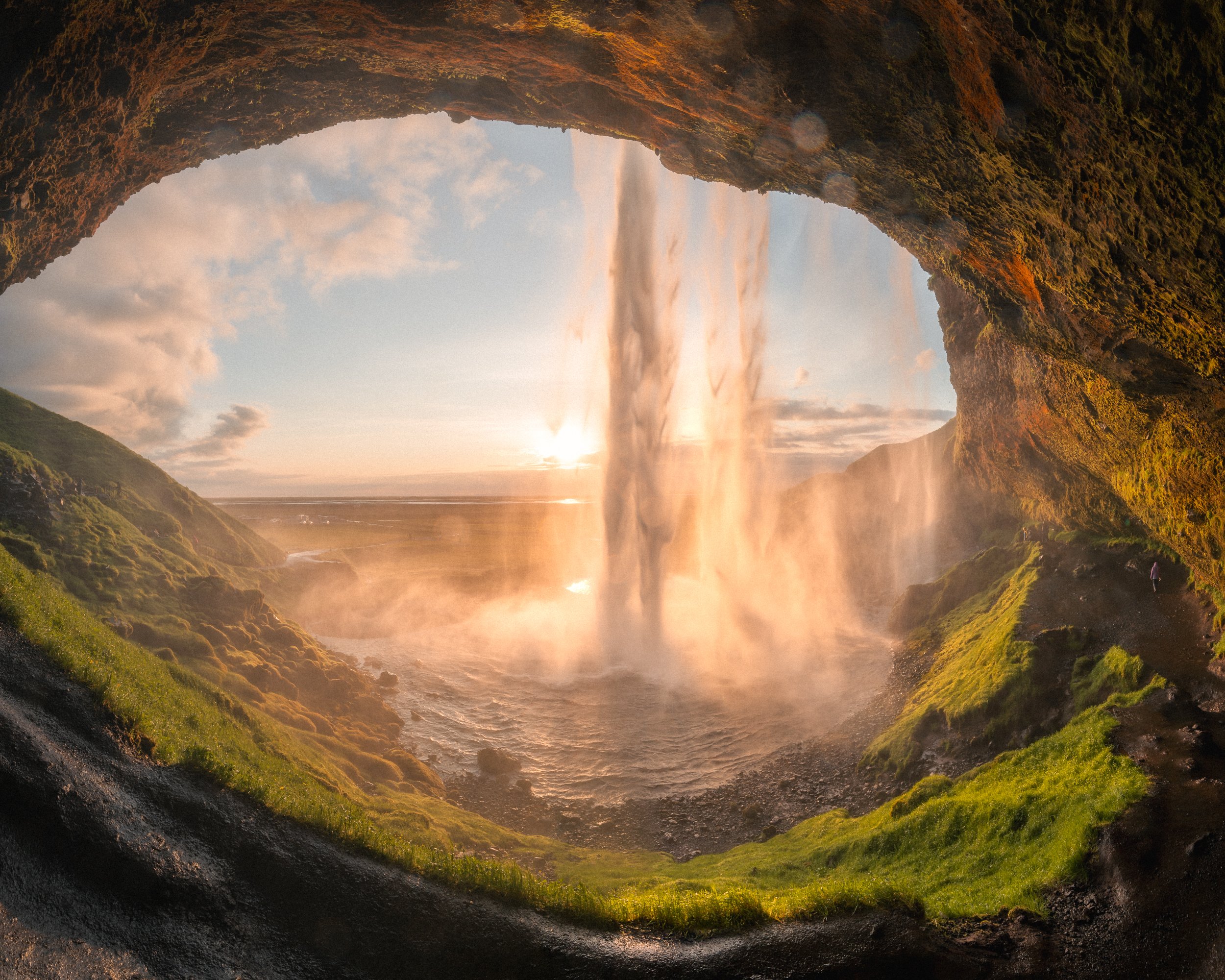 Seljalandsfoss waterfall during a midnight sunset, Iceland.
