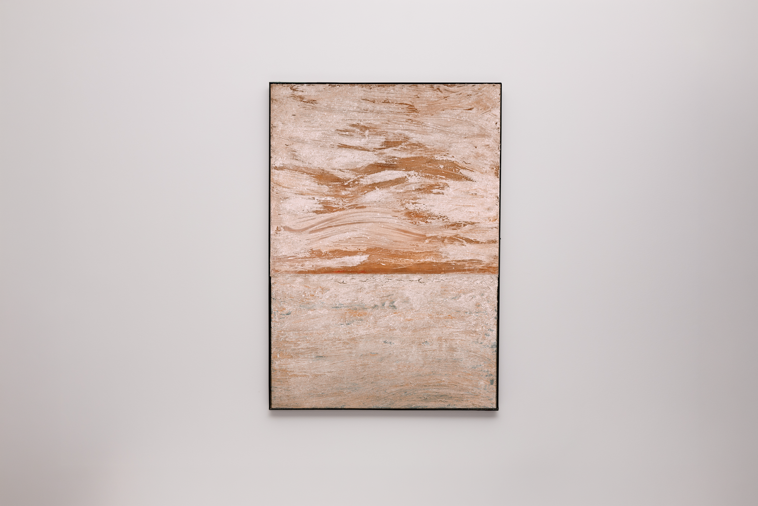 A framed abstract painting with horizontal brushstrokes in shades of beige, brown, and white, hanging on a plain white wall.
