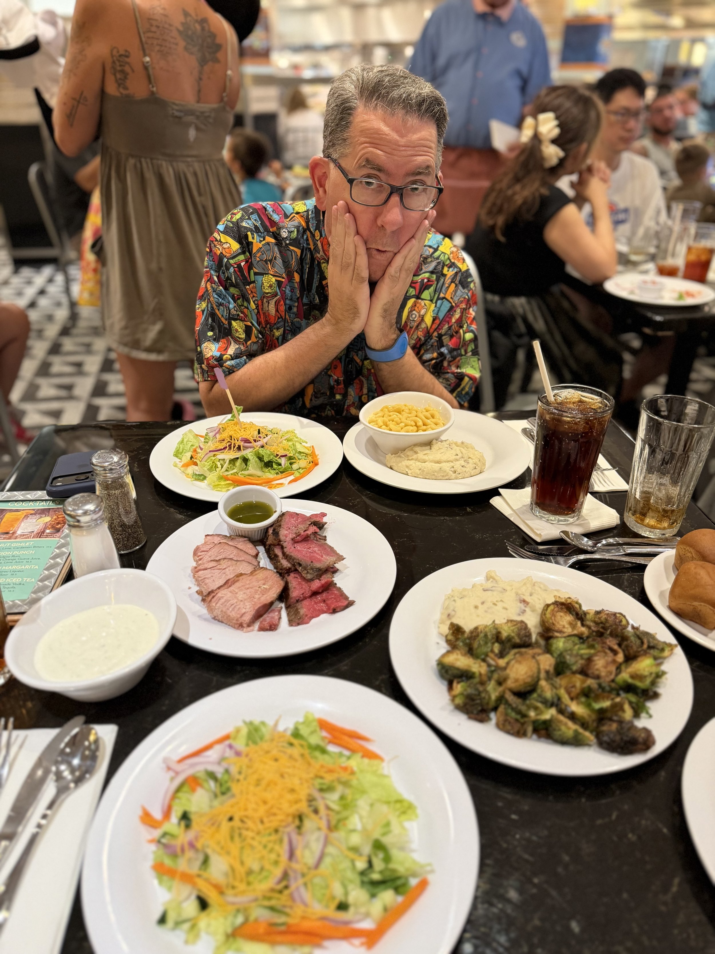 Brandon with plate of food at Hollywood and Vine
