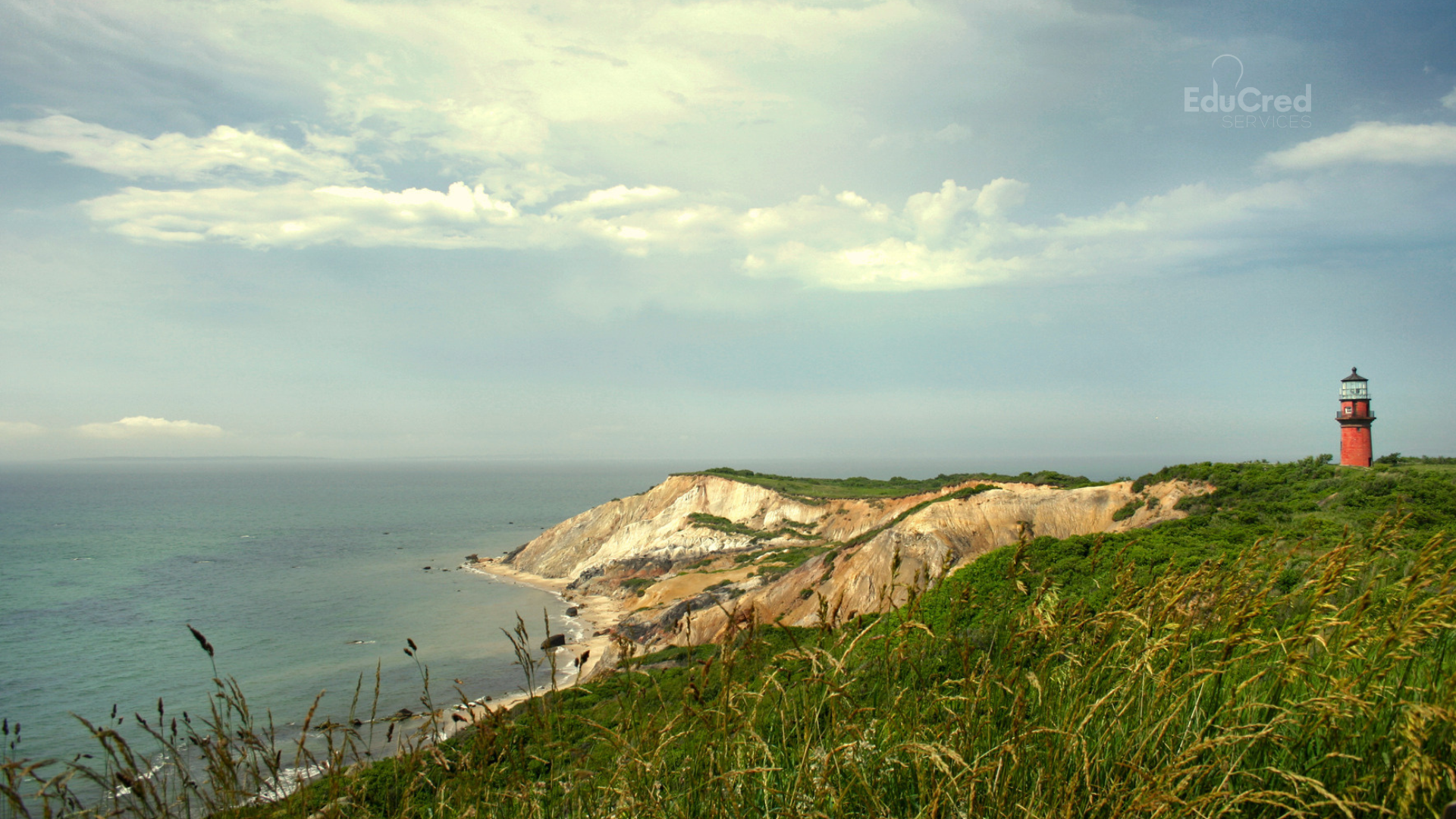 A coastal cliff with a lighthouse, ominous weather in the distance