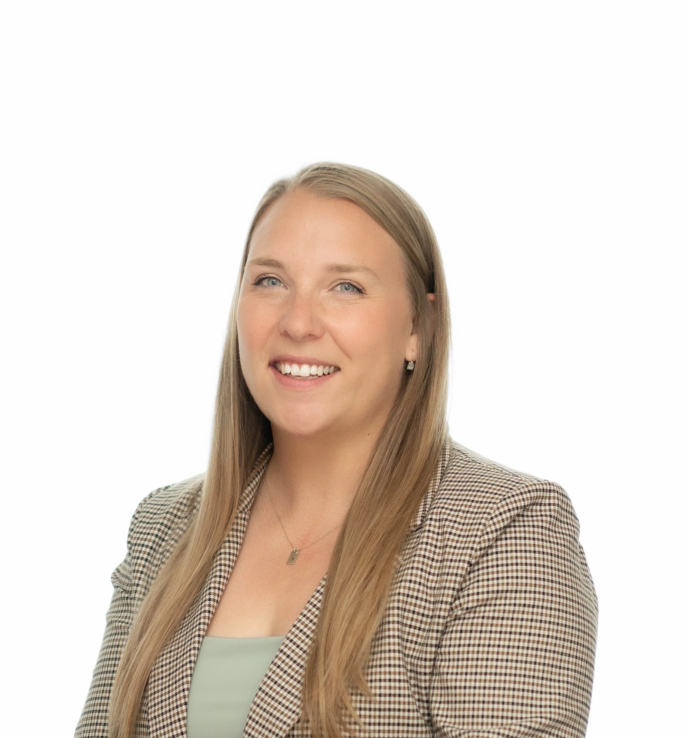 Close-up of a woman with long blonde hair, blue eyes, and a bright smile, wearing a checkered blazer over a light green top, against a white background.