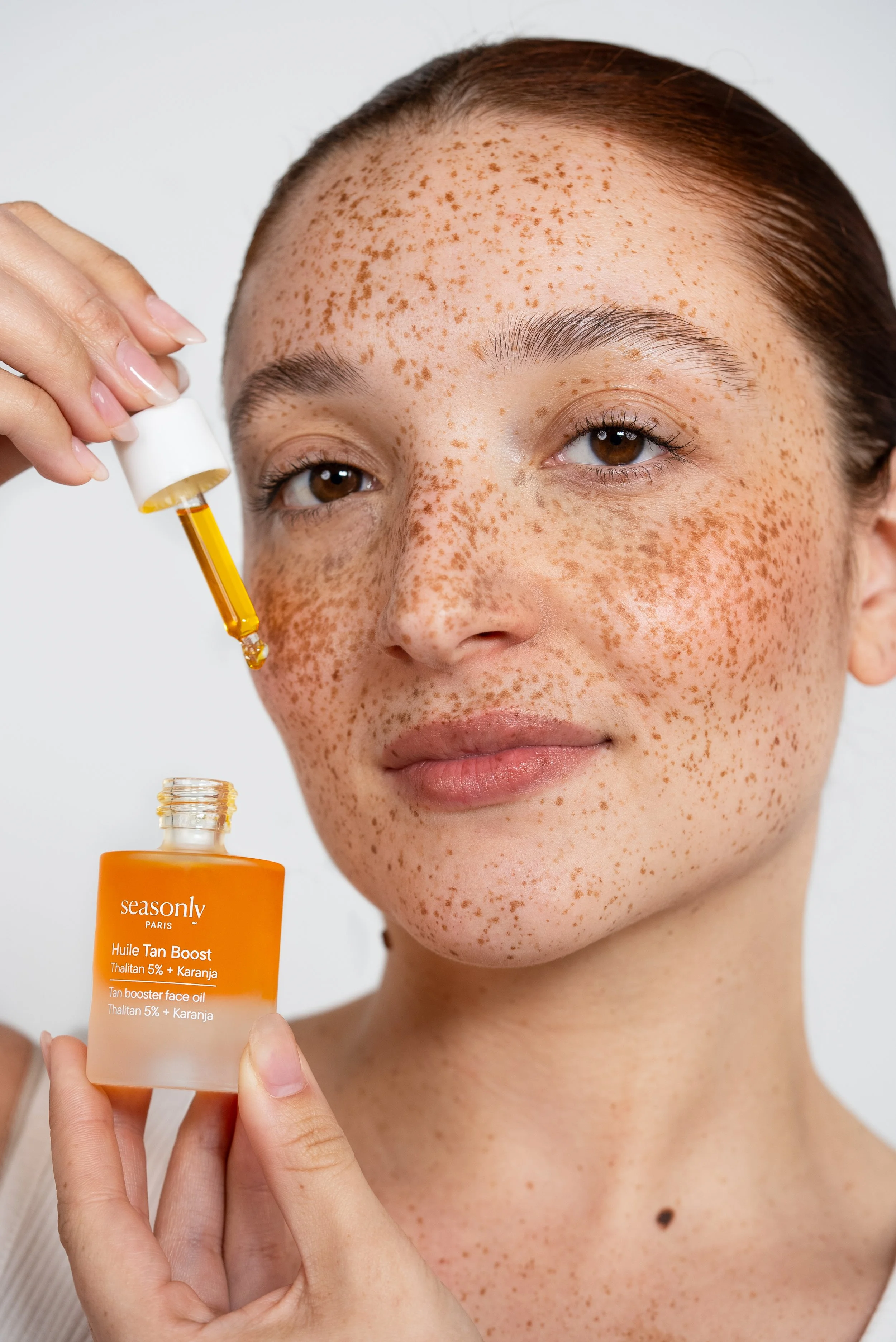 Justine Huile Tan Boost 02.jpg