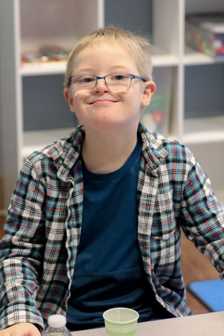 A smiling child in the Superstars special needs ministry