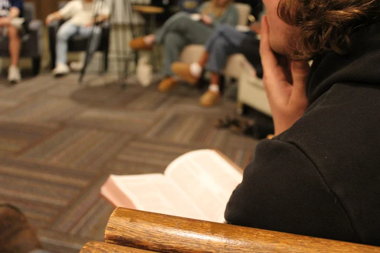 An open Bible during a message