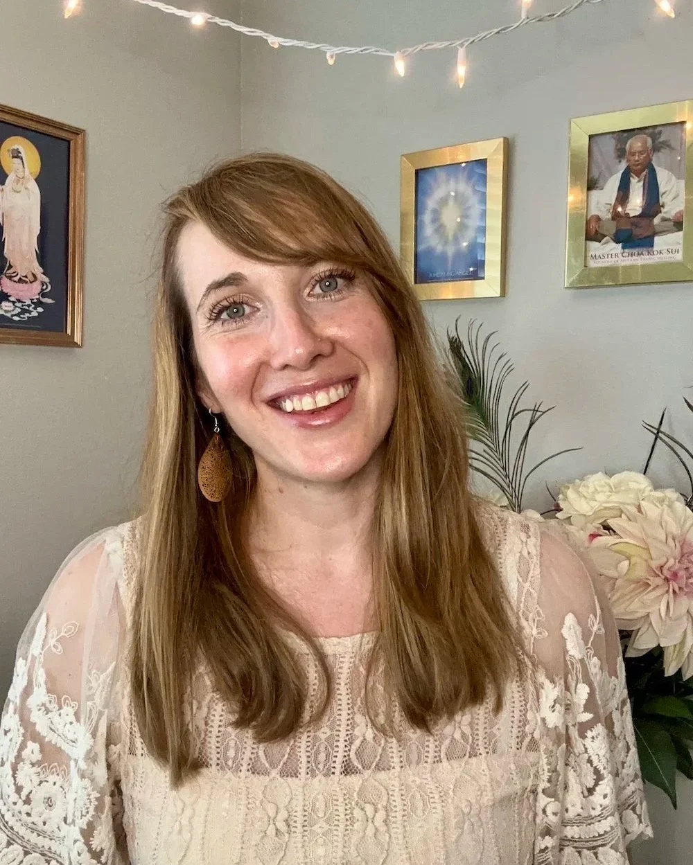 Suzie DeVoe energy healer smiling in her healing room