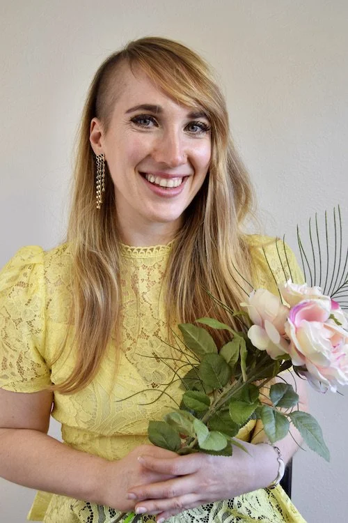 Suzie DeVoe Pranic Healer holding flowers