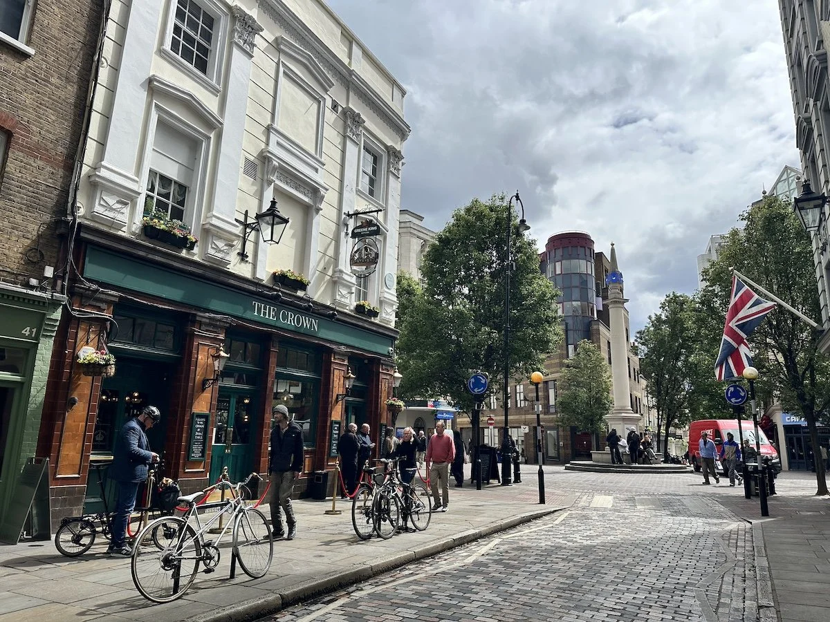 Picture of pub and statue in Seven Dials, London.