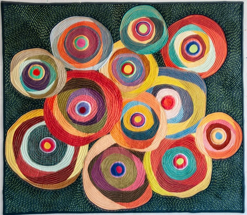 Round and Round
34” x 39”
Appliquéd fabrics, hand and machine stitched

SOLD
