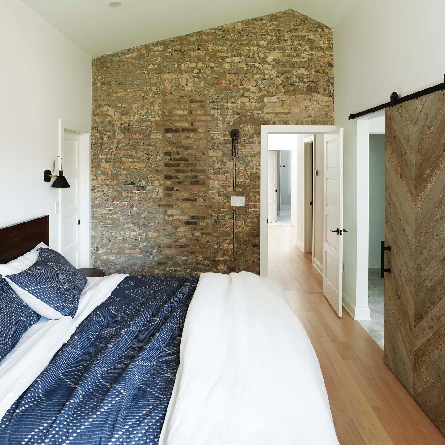 The owners of this 1880s, brick, single family home were looking add a primary bedroom suite without sacrificing their yard. Our team provided more interior space by designing a 400 square foot second floor addition which hovers in the canopy of an o