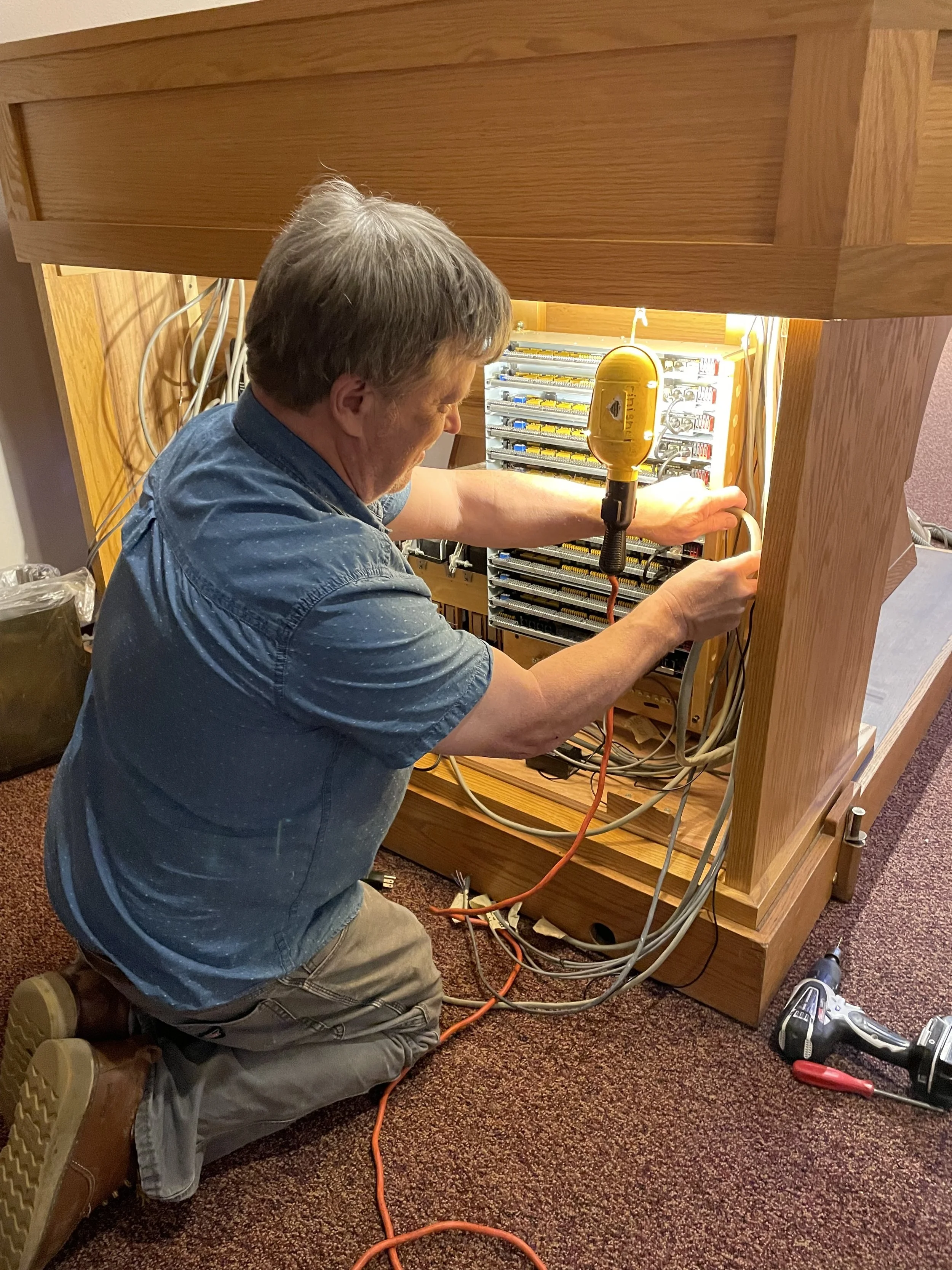 Rick wiring the console.jpeg