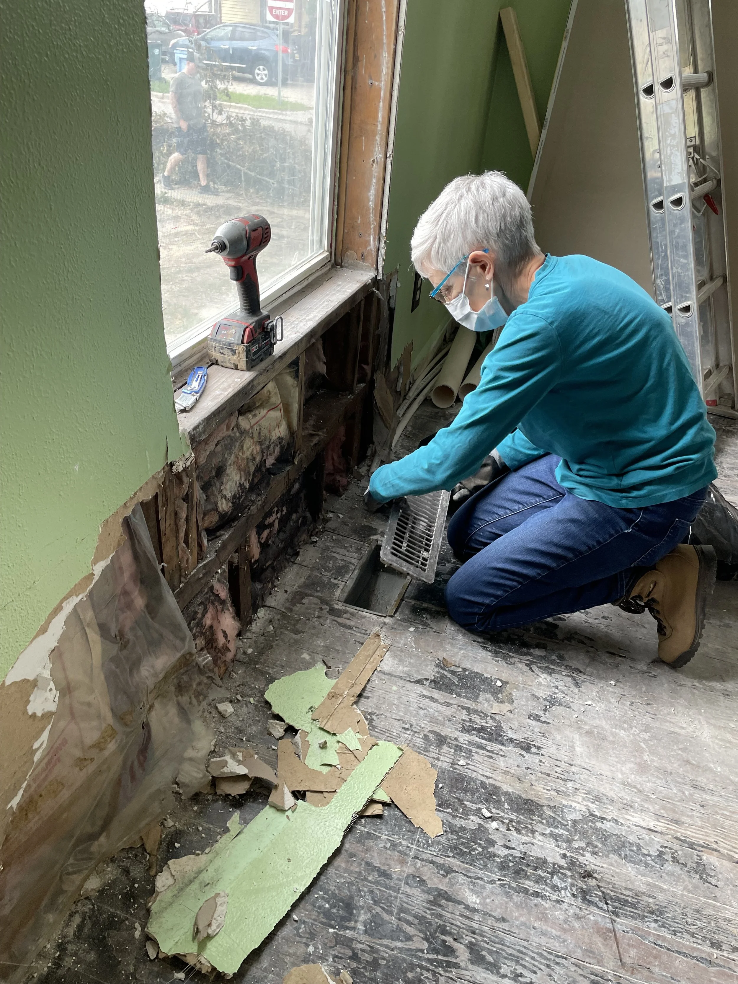 Jana removing insulation (1).jpeg