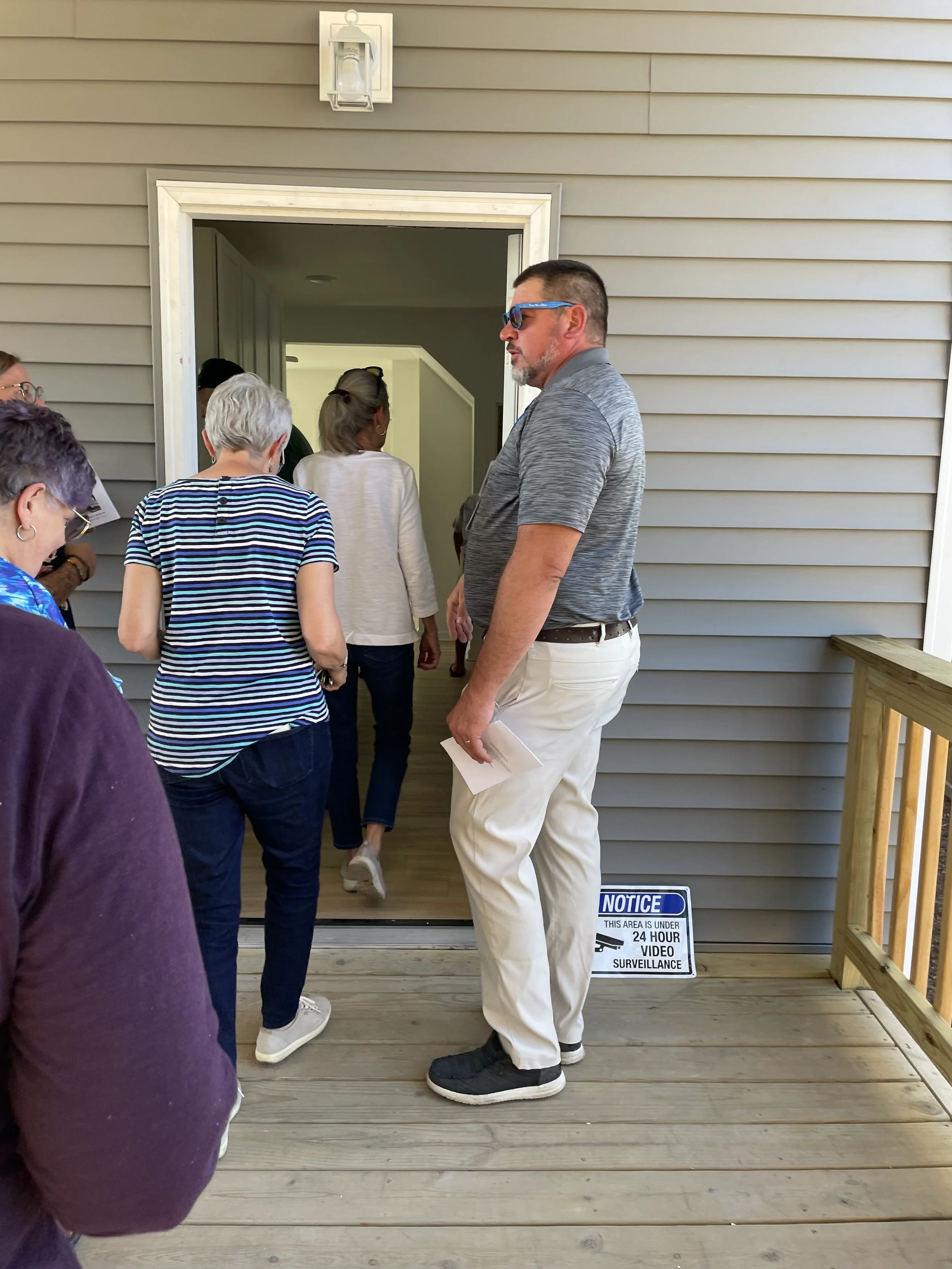 lining up for house tour.jpeg