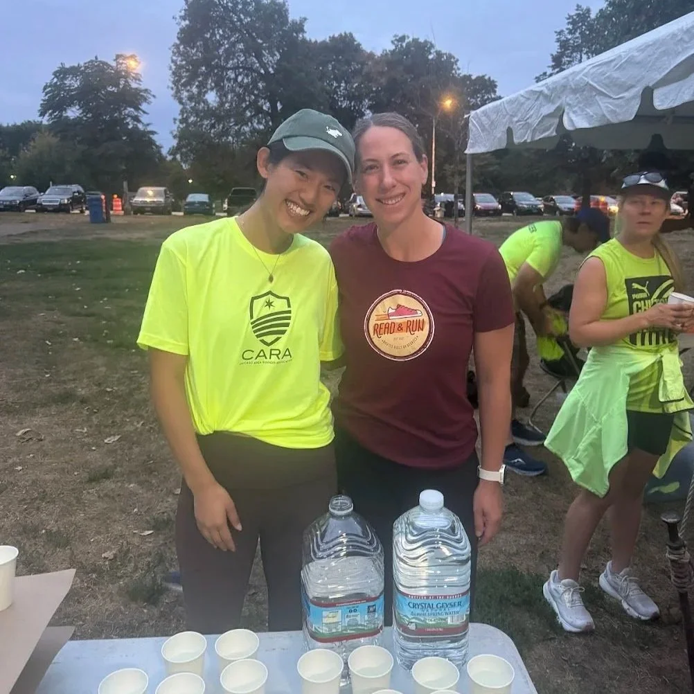 Runners at an aid station at CARA's Ready to Run 20 Miler