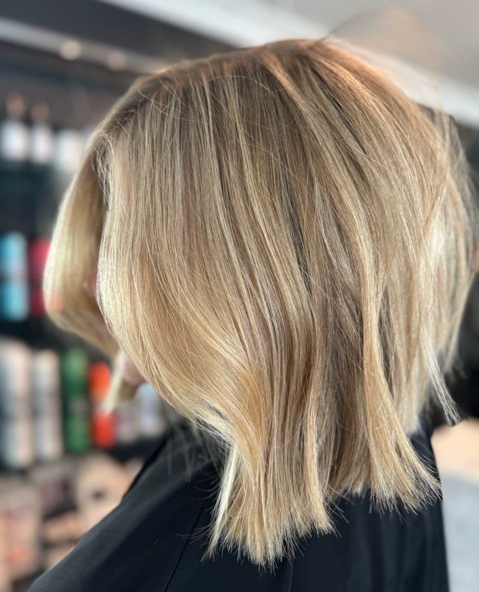 Let's take a moment to appreciate the stunning work from Stylist Kayla with this gorgeous blonde bob! 😍 💇&zwj;♀️⁠ @kayla_beautyfromwithin⁠
⁠
With her expertise and creativity, Kayla knows exactly how to bring out the best in every client. Trust us,