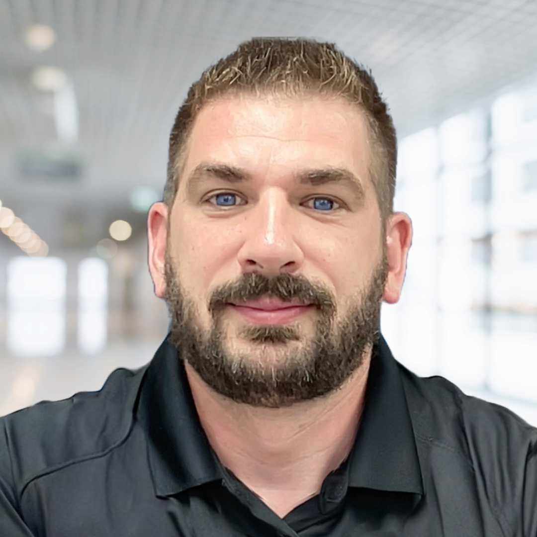 John Headshot black polo.png