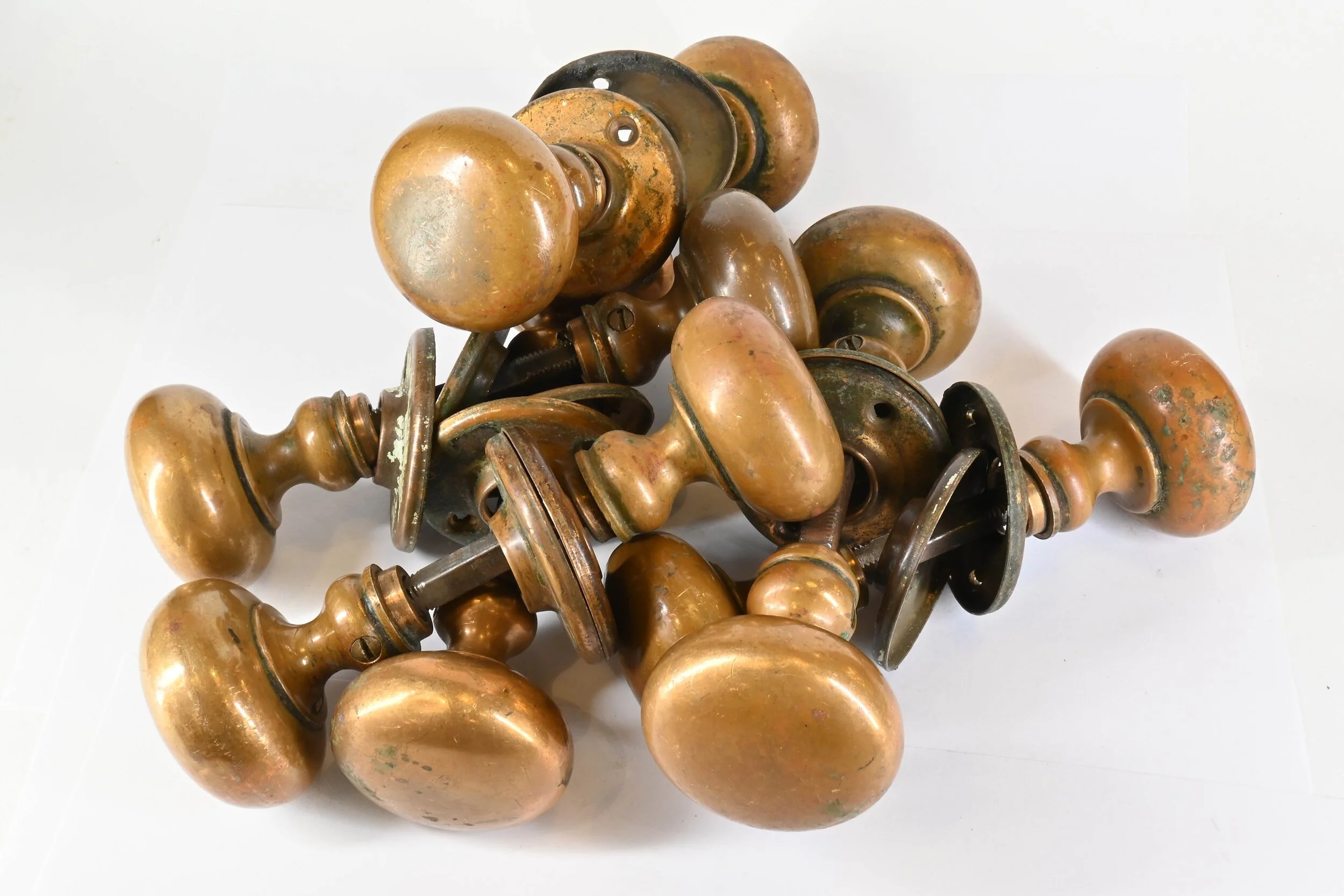49300+brass+knob+%26+rosette+sets+30+available+piled.jpg