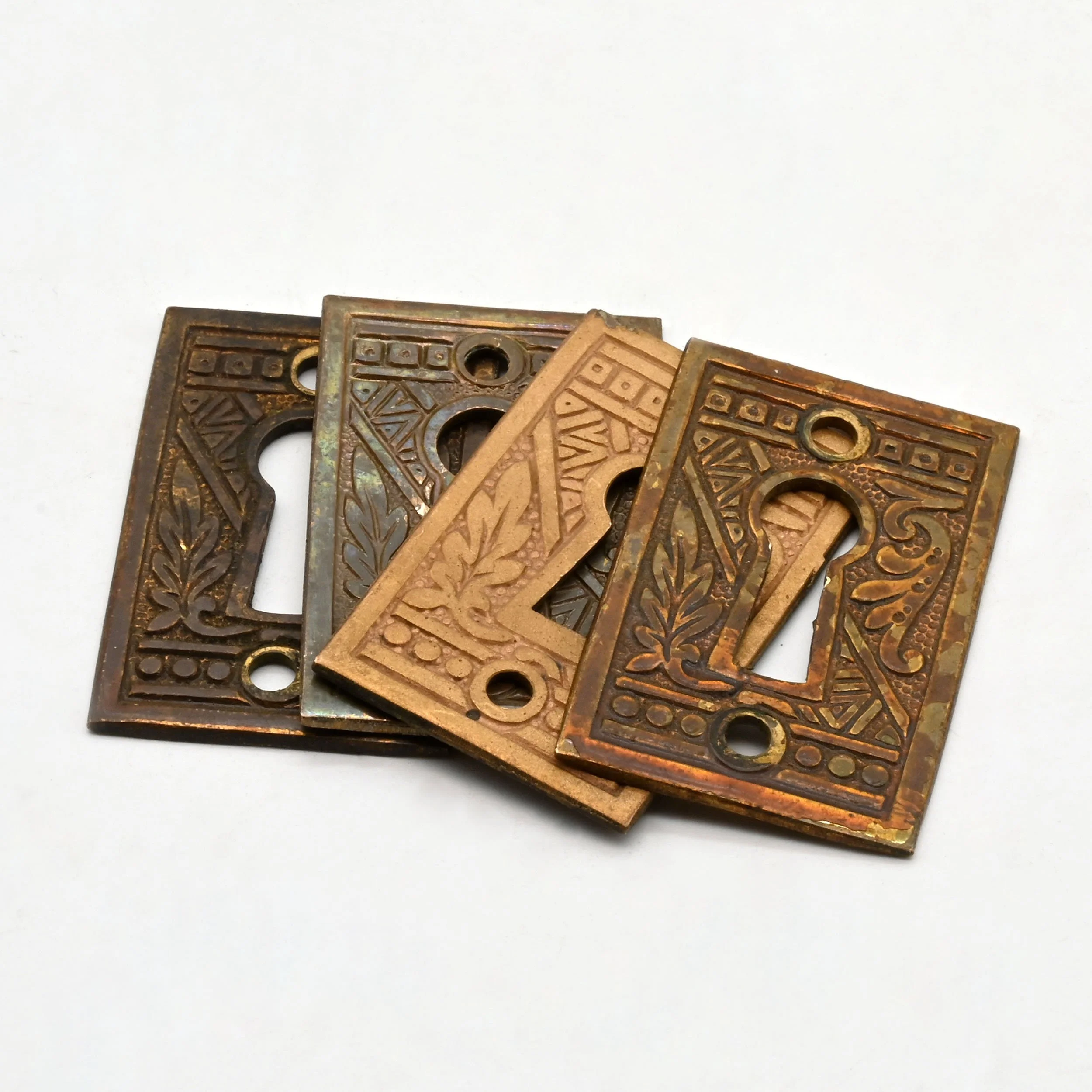 H62133+brass+eastlake+keyhole+cover+with+feather+6.jpg