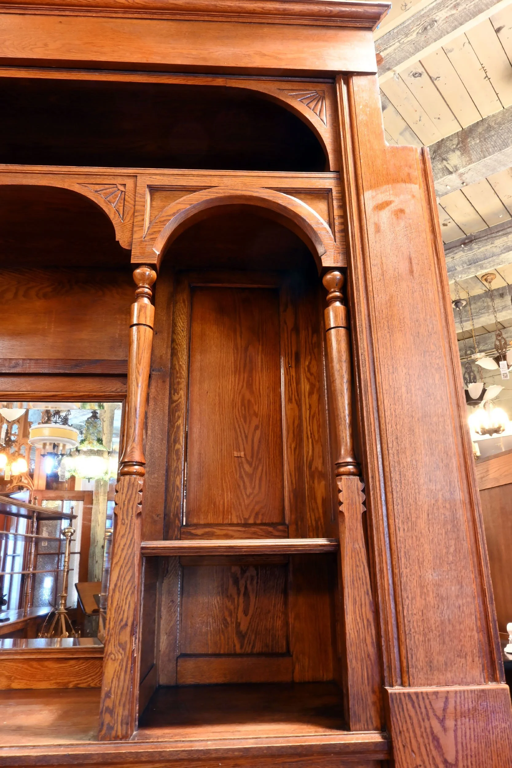 62605+oversized+oak+buffet+with+open+arches+and+turned+spindles+2.jpg