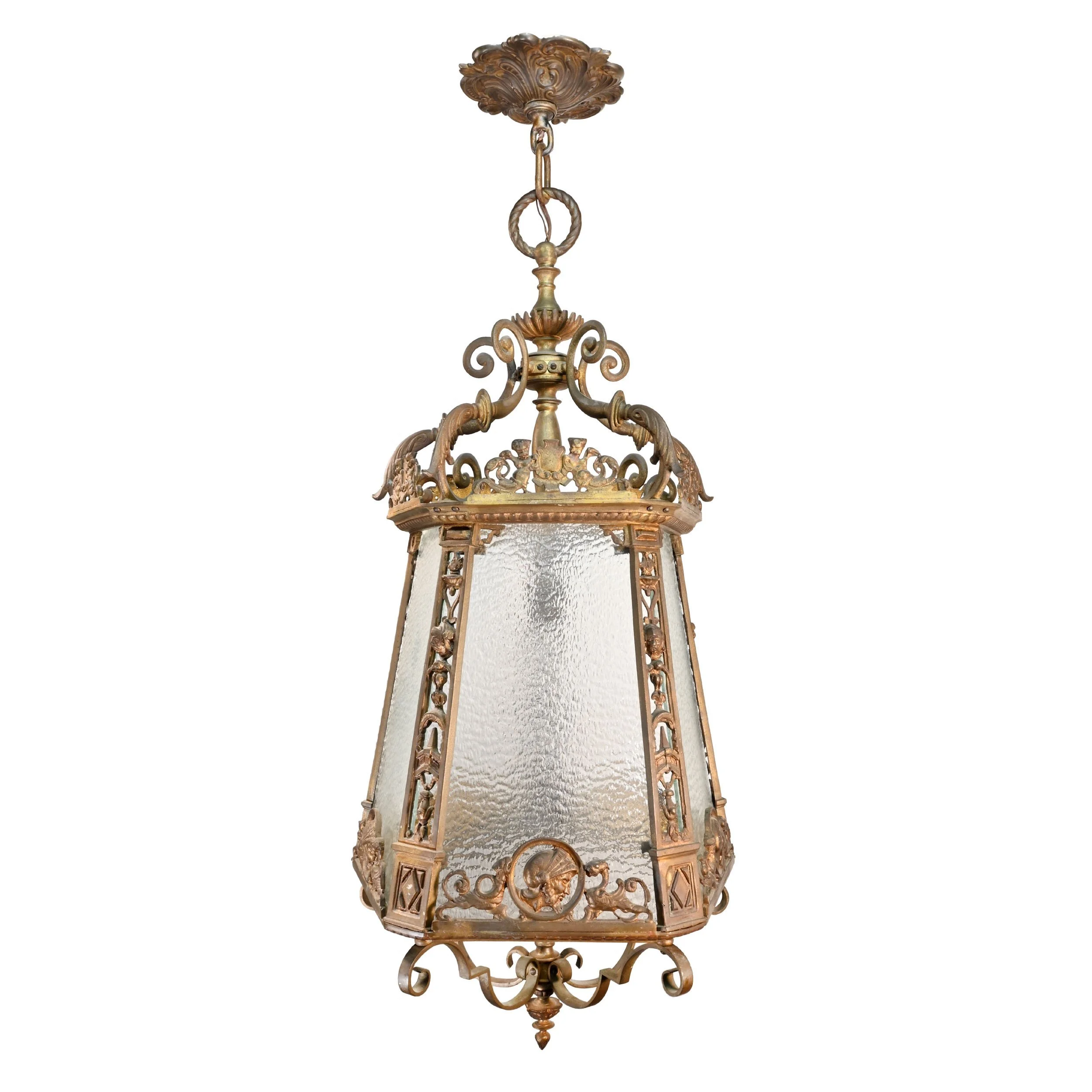 62681+ornate+lantern+style+pendant+with+soldier+and+cherub+details+and+hammered+glass+1.jpg