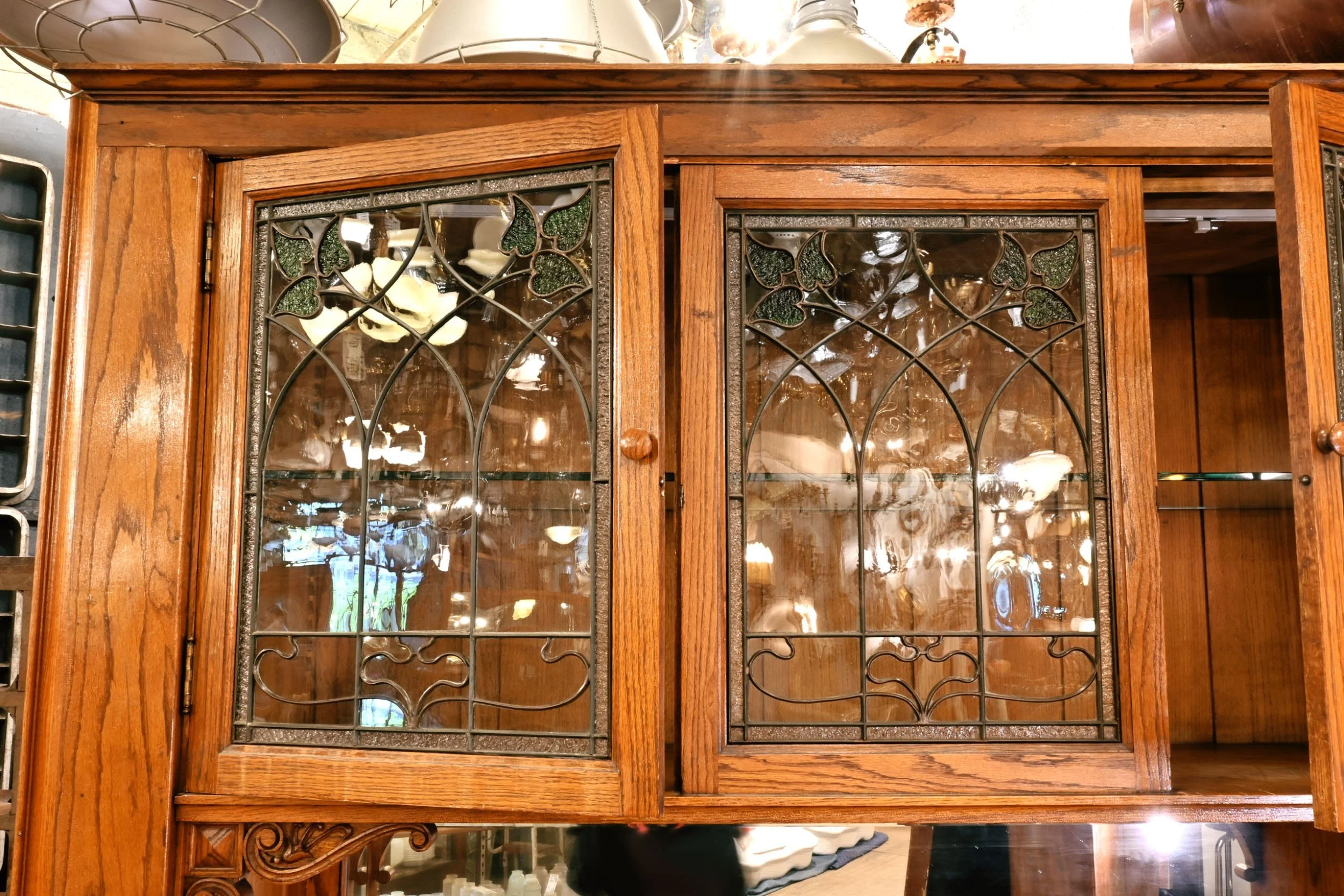 63070+oak+buffet+with+leafy+design+leaded+glass+uppers+5.jpg