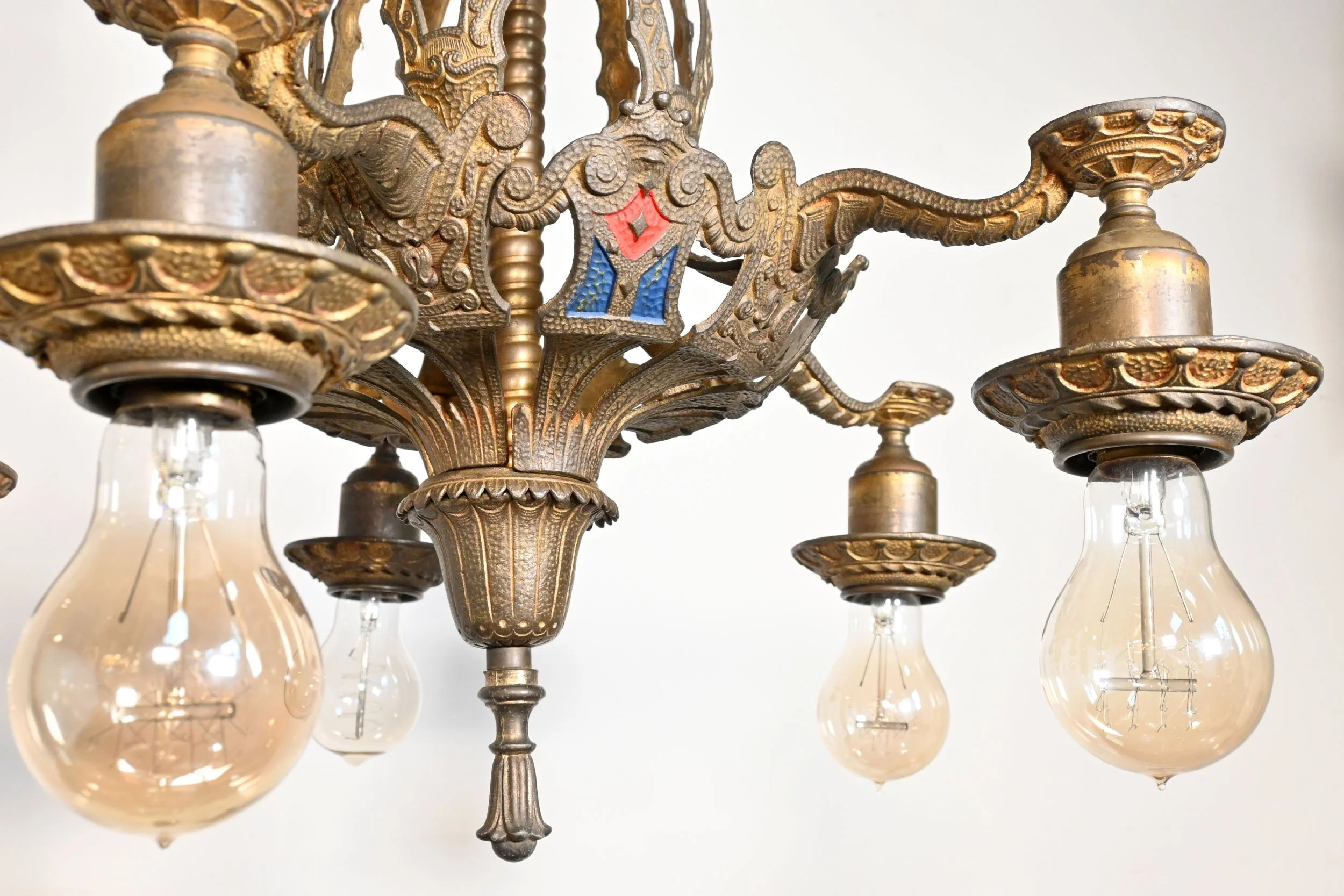 24052+ornate+cast+brass+tudor+five+bulb+chandelier+with+red+and+blue+accents+4.jpg