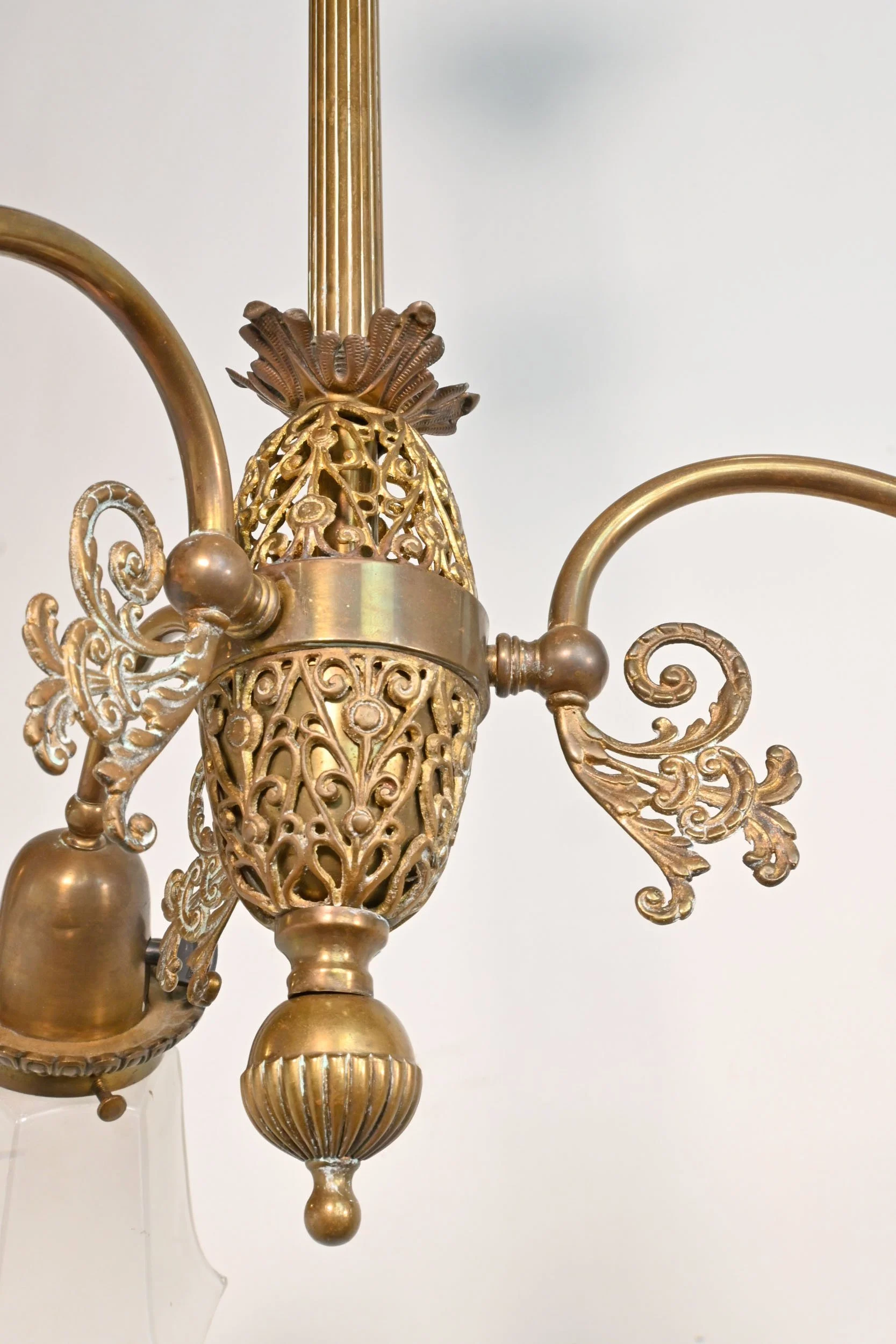 24175+ornate+brass+early+electric+chandelier+with+frosted+shades+and+fleur+de+lis+detail+2.jpg