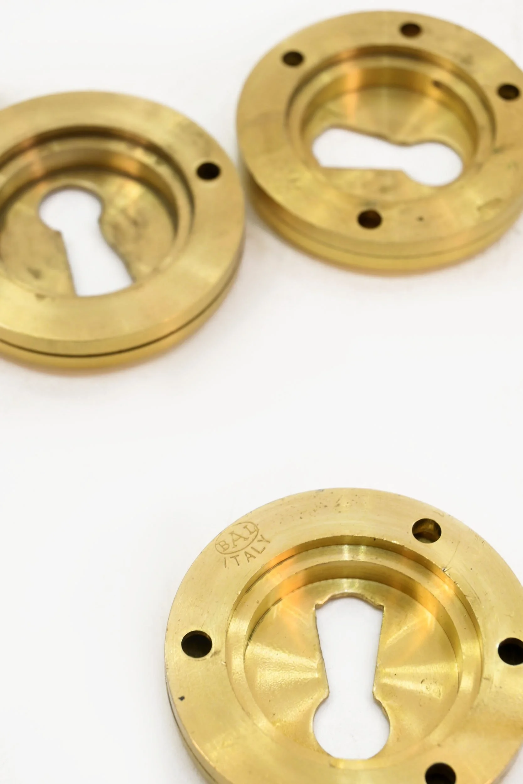 24227+brass+new+old+stock+keyhole+covers+3.jpg