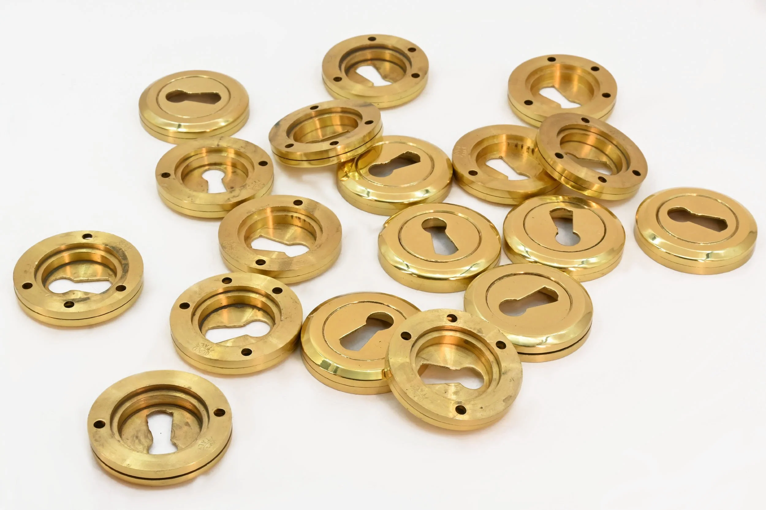 24227+brass+new+old+stock+keyhole+covers+2.jpg