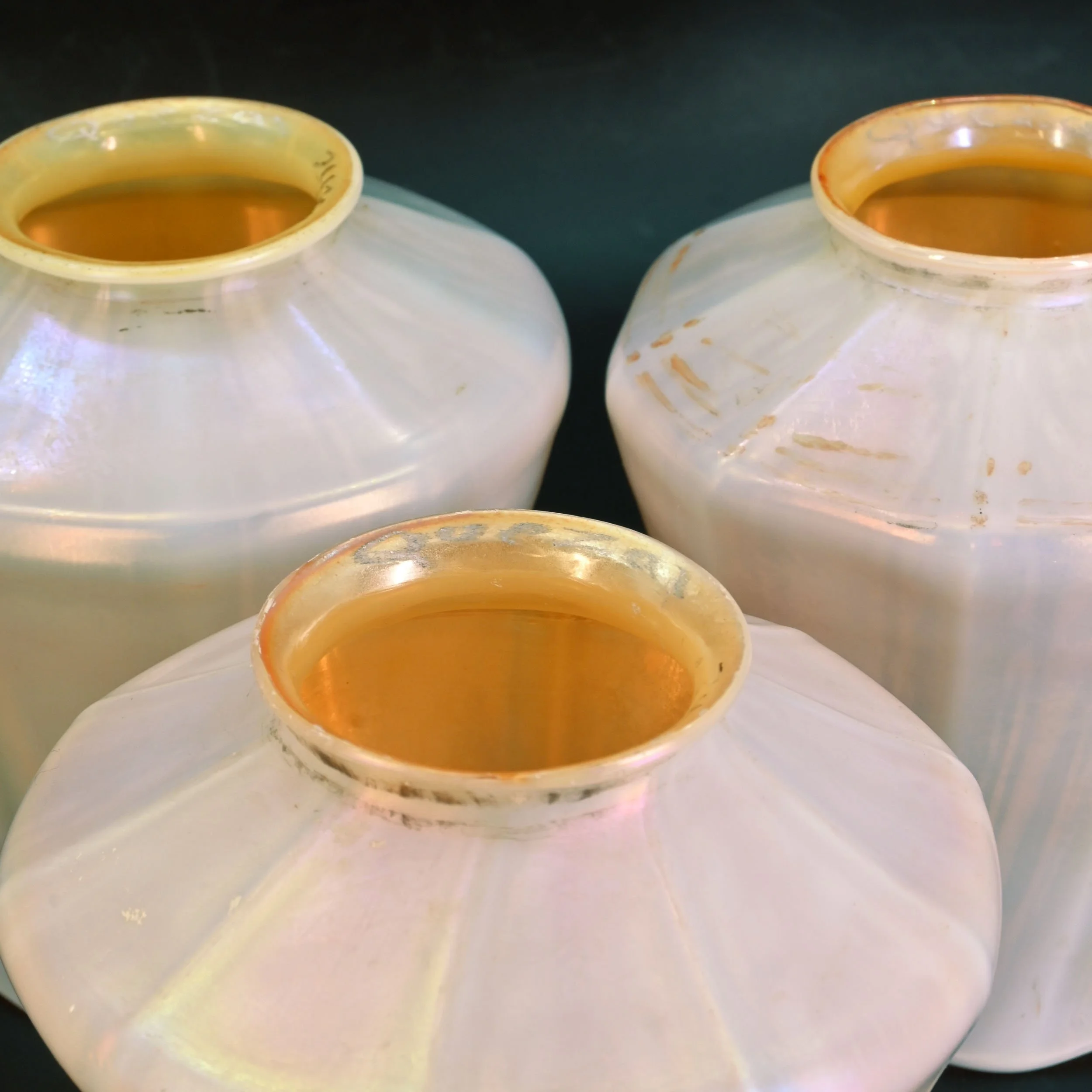 24354+quezal+calcite+and+aurene+fluted+tapered+shades+3.jpg