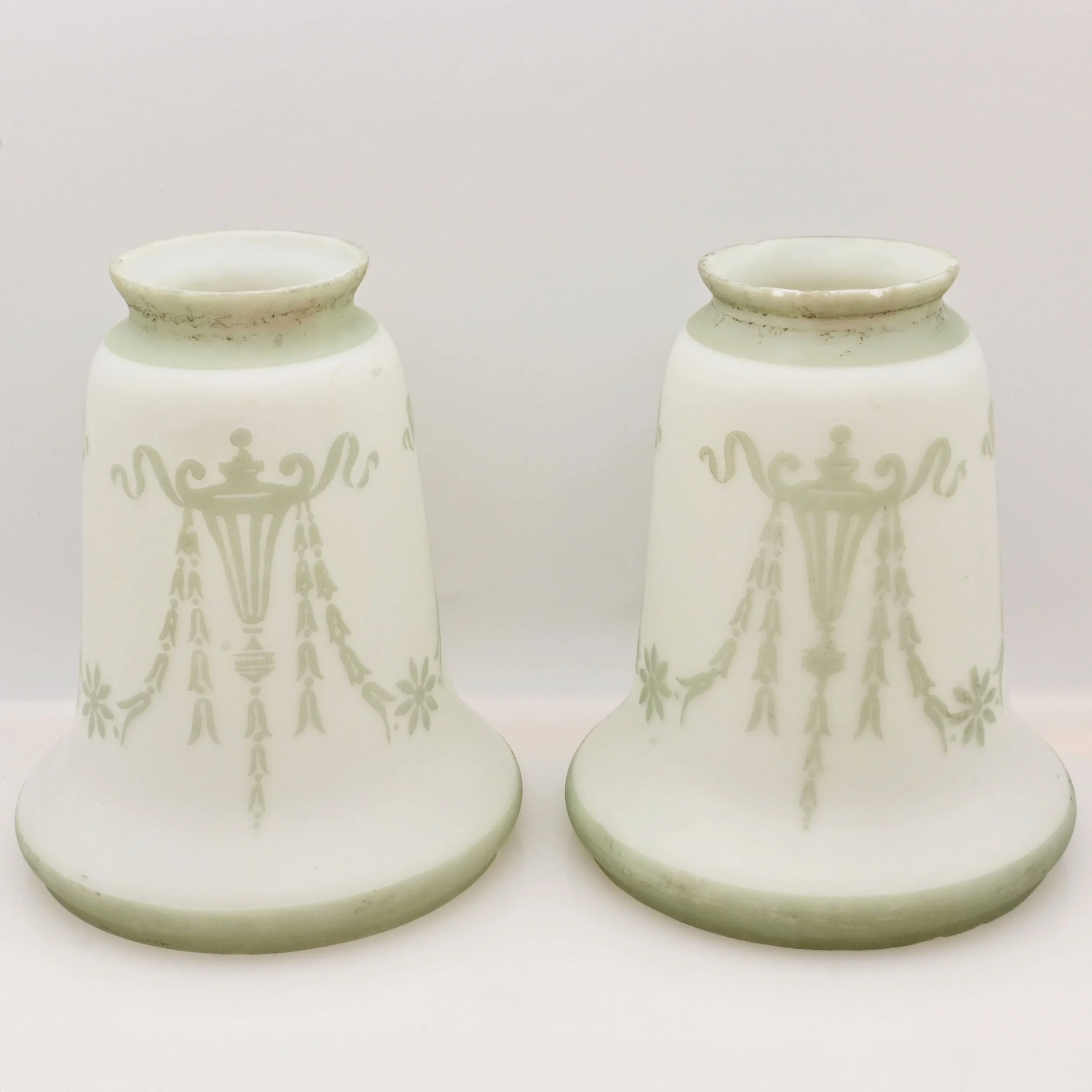 26137+pair+of+unsigned+steuben+white+calcite+glass+shades+with+raised+green+urn+pattern+1.jpg