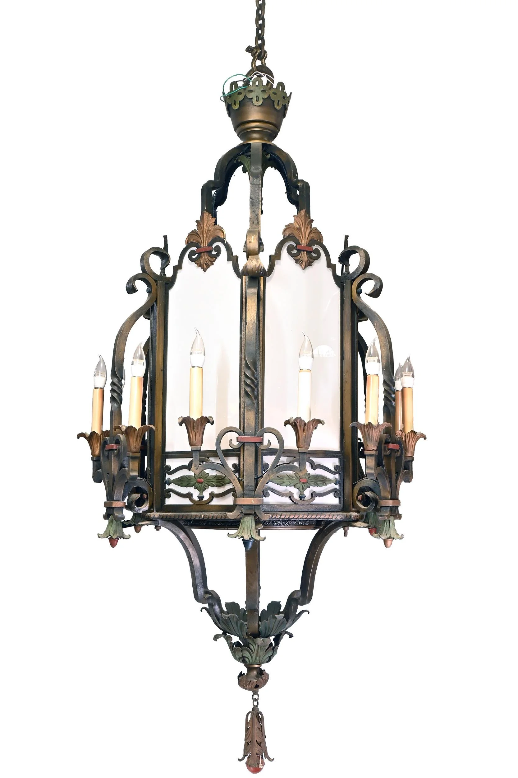 four foot diameter cast iron with original polychrome 18 light chandelier