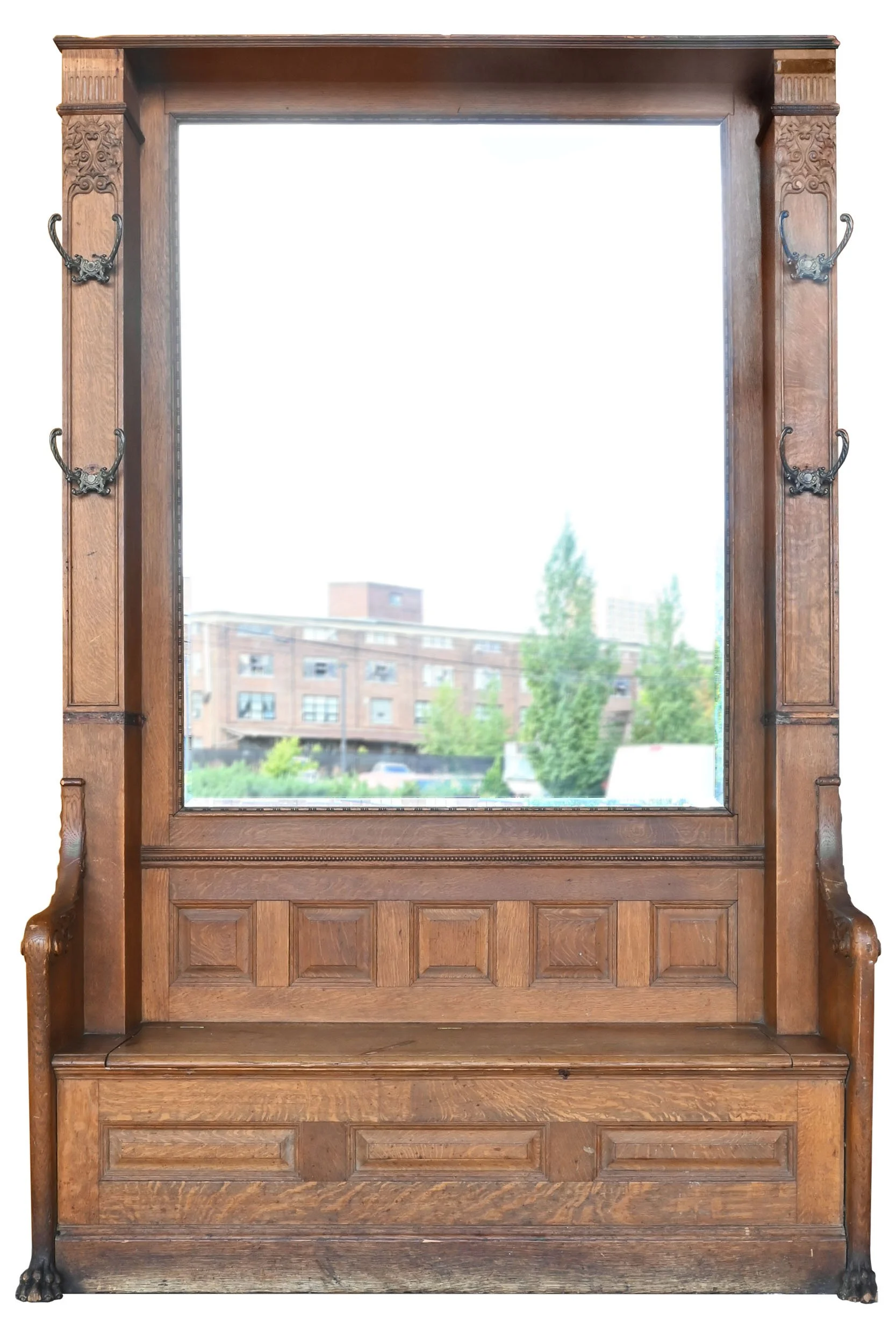 oversized hall mirror tiger oak built-in with carved details and bench storage