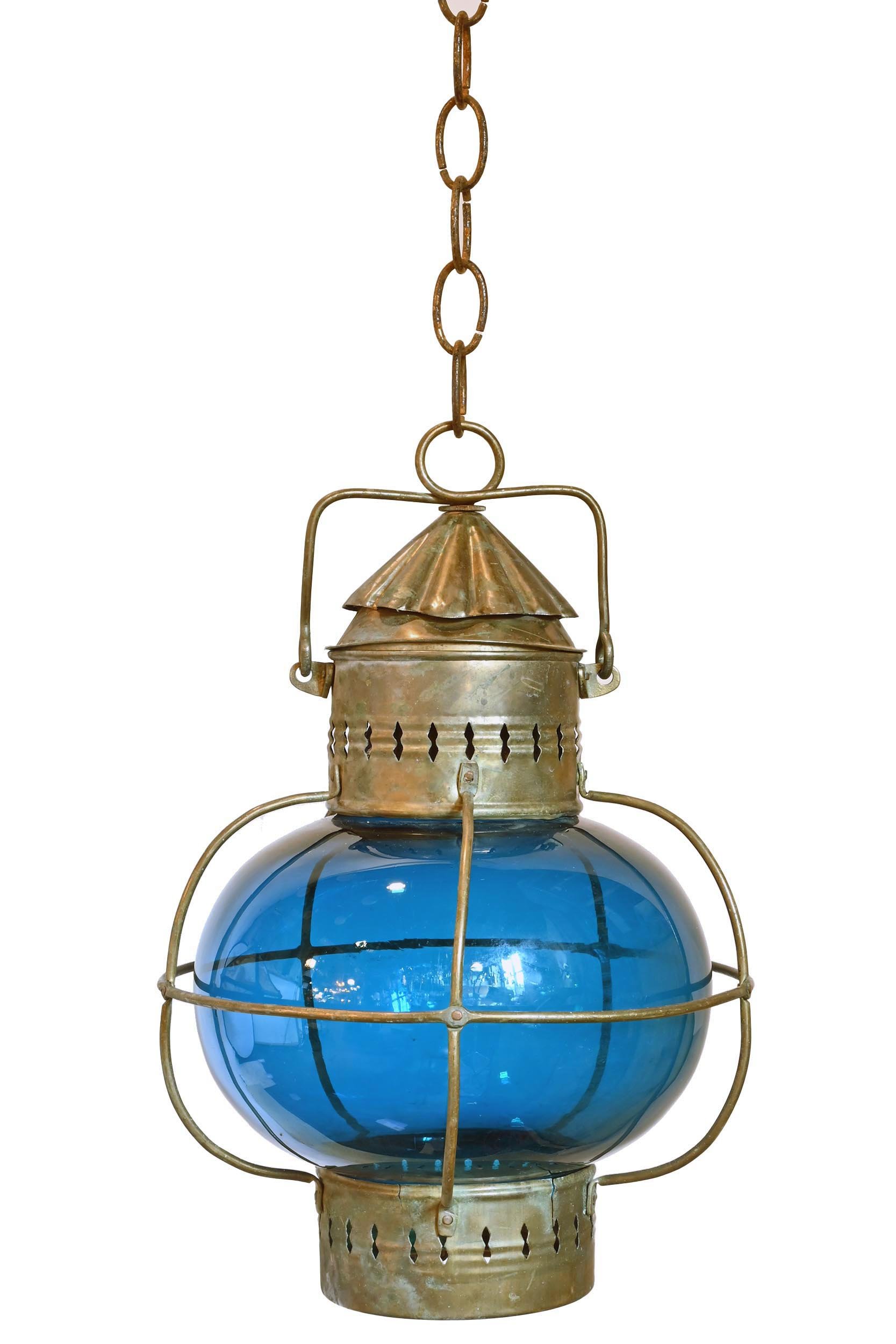 primitive pendant lantern with blown blue glass