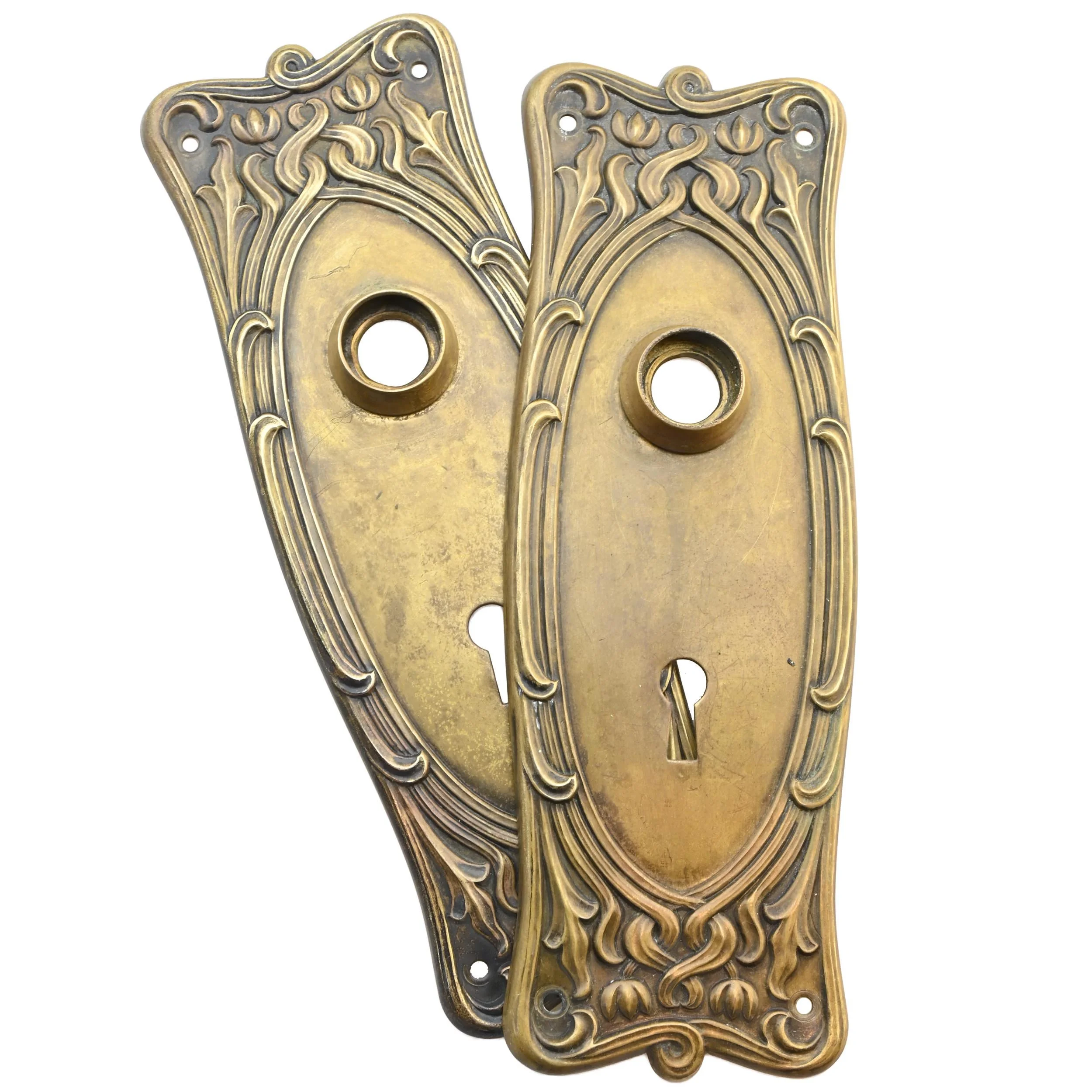 brass "normandy" door plate escutcheon pairs by lockwood