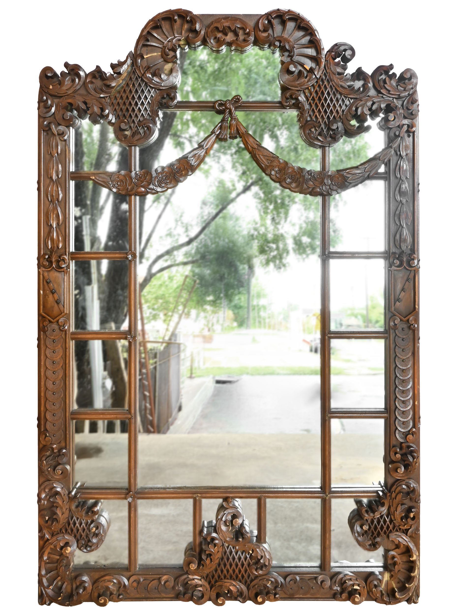 oversized intricately carved over the top mahogany hall mirror