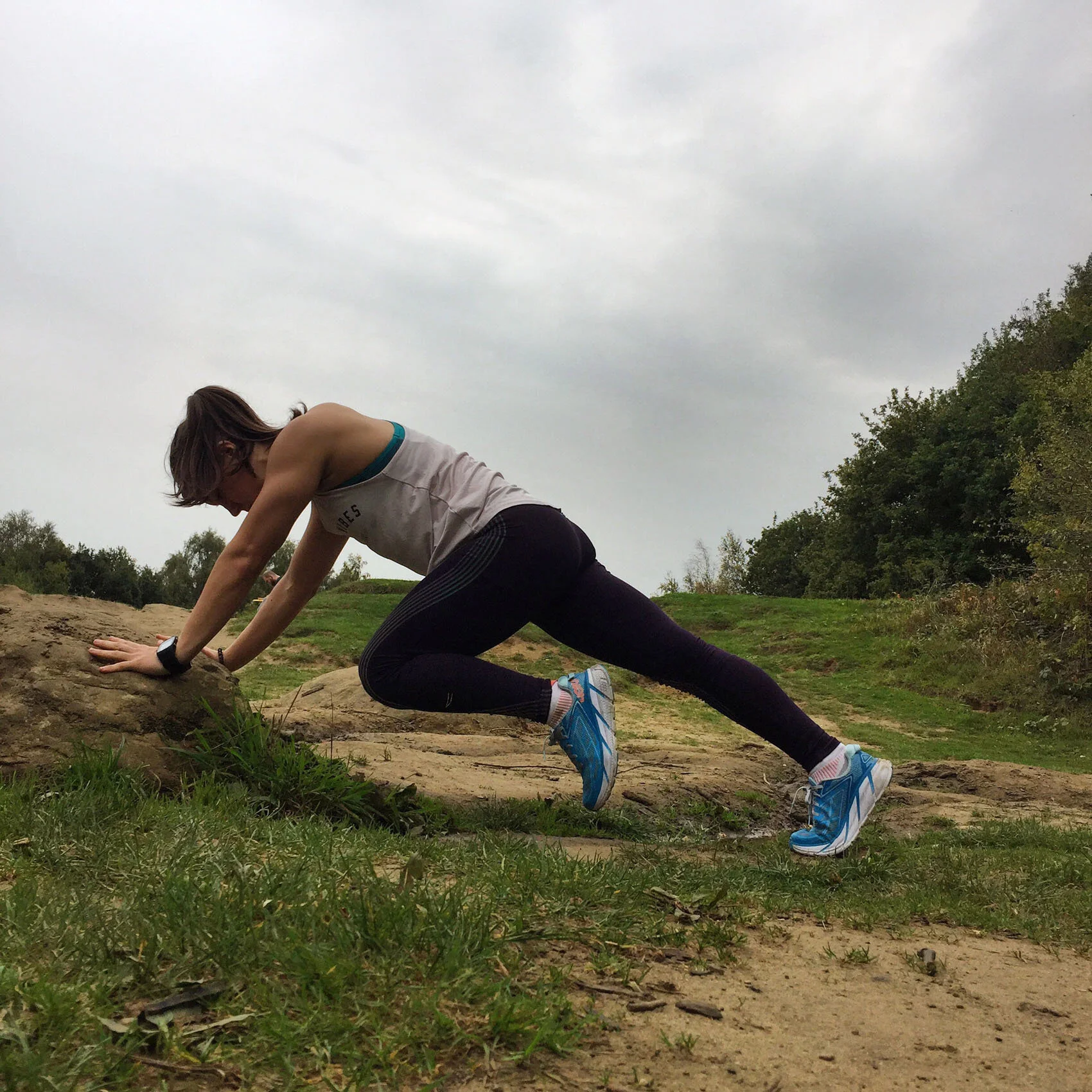 millennial-woman-exercising-outdoors-T2AQC7A.jpg
