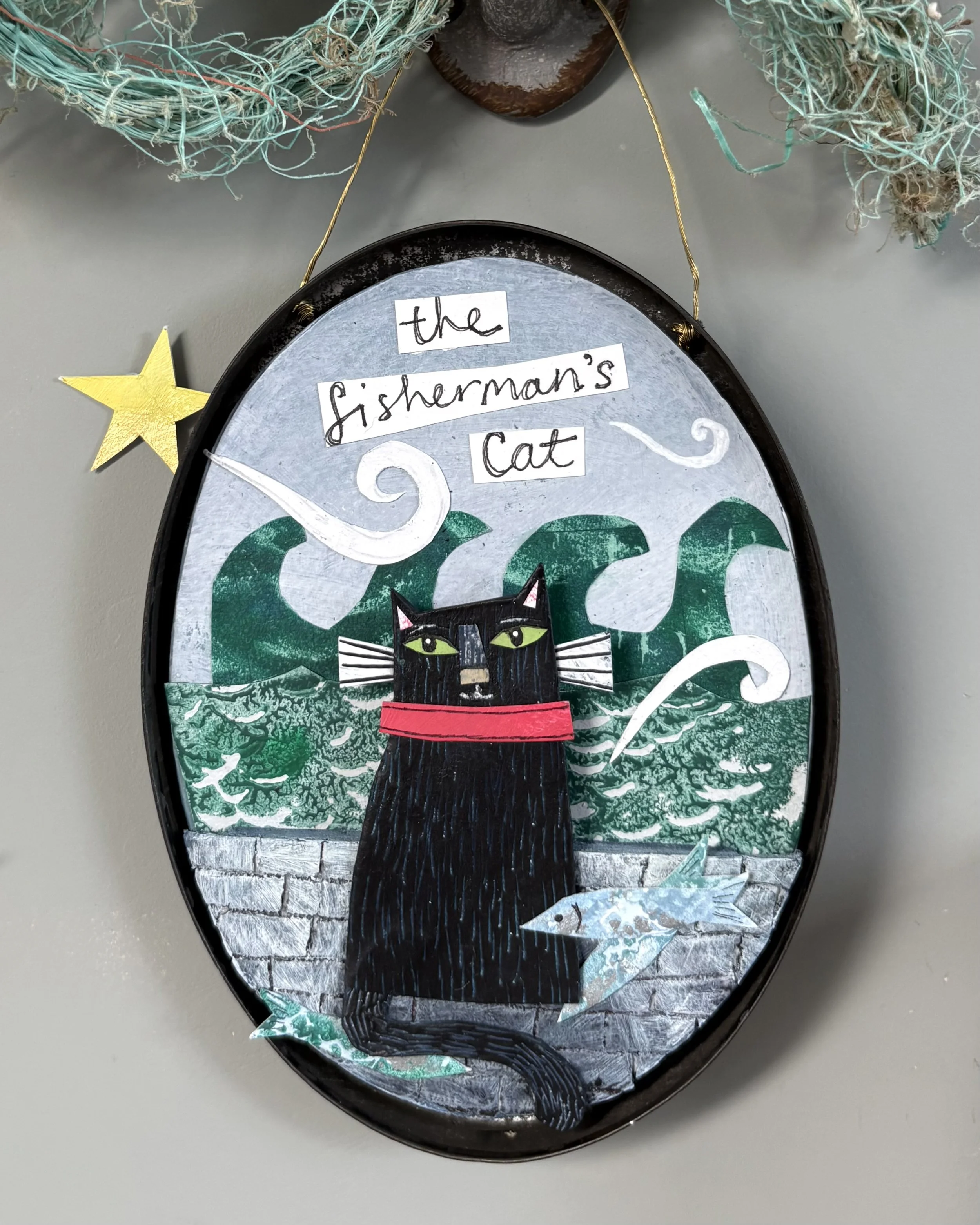 Collage diorama in vintage tin lid