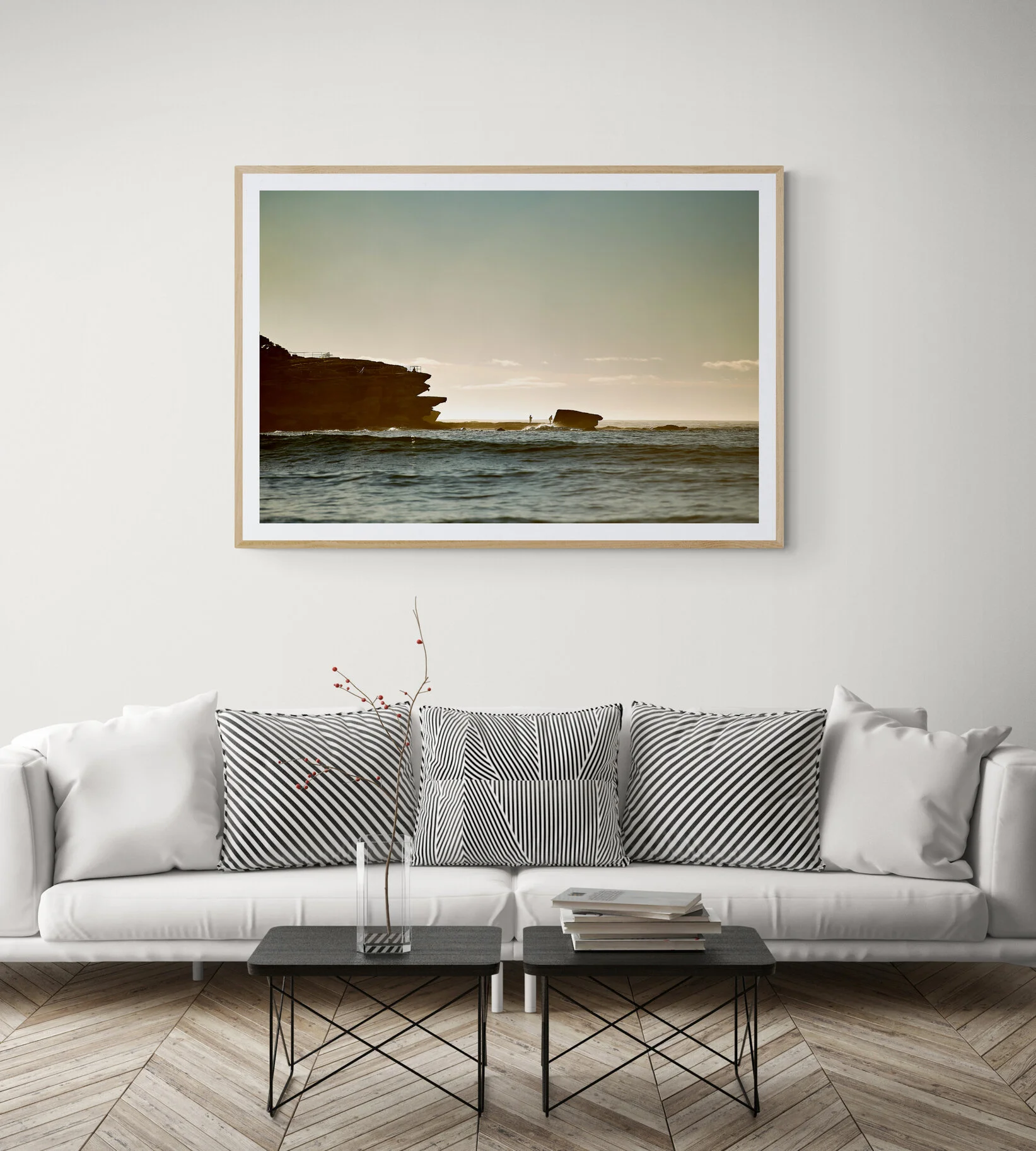 Comfy_long_sofa_with_striped_cushions_in_lounge.jpg