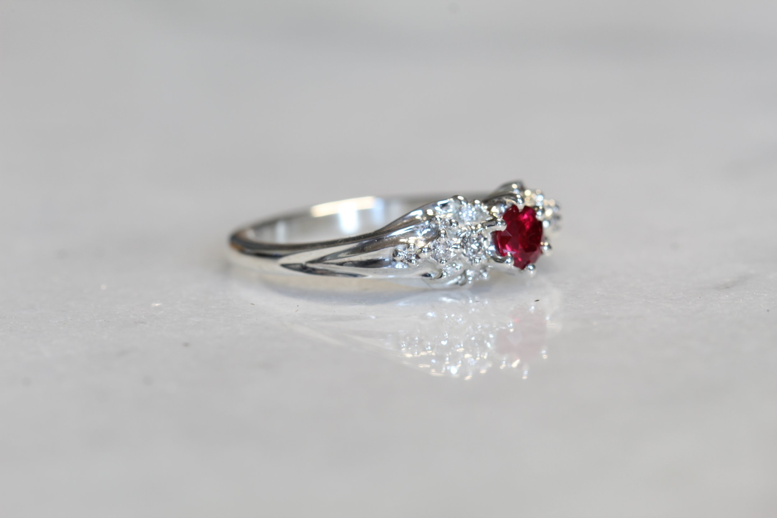 Ruby, diamond, and sterling silver. 2021